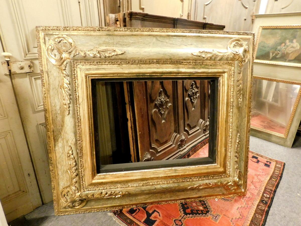 20th century antique lacquered frame with gold decorations, measuring 174 x 151 cm, light 96 x 69 cm,
From sud of Italy, used by tv frame in luxury hotel.