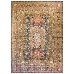 20th Century Antique Oversize Persian Tabriz Rug with Colorful Floral Details