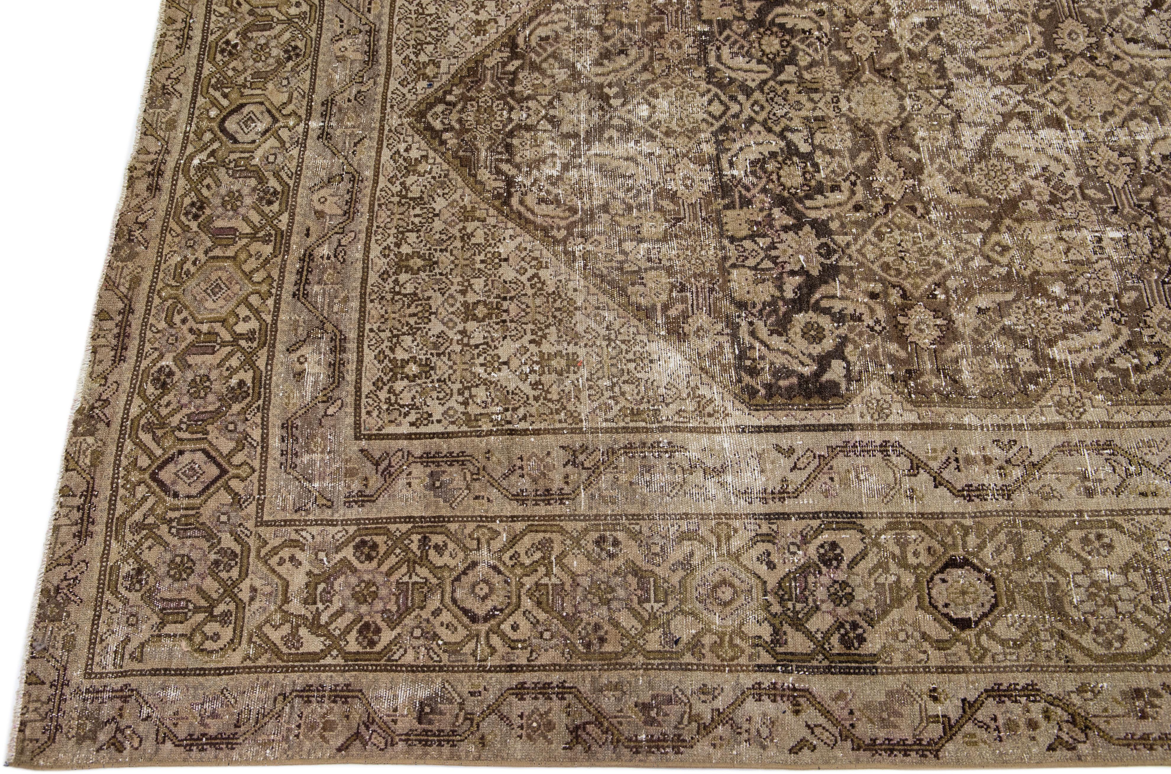 20th Century Antique Persian Malayer Handmade Medallion Brown Wool Rug In Distressed Condition For Sale In Norwalk, CT