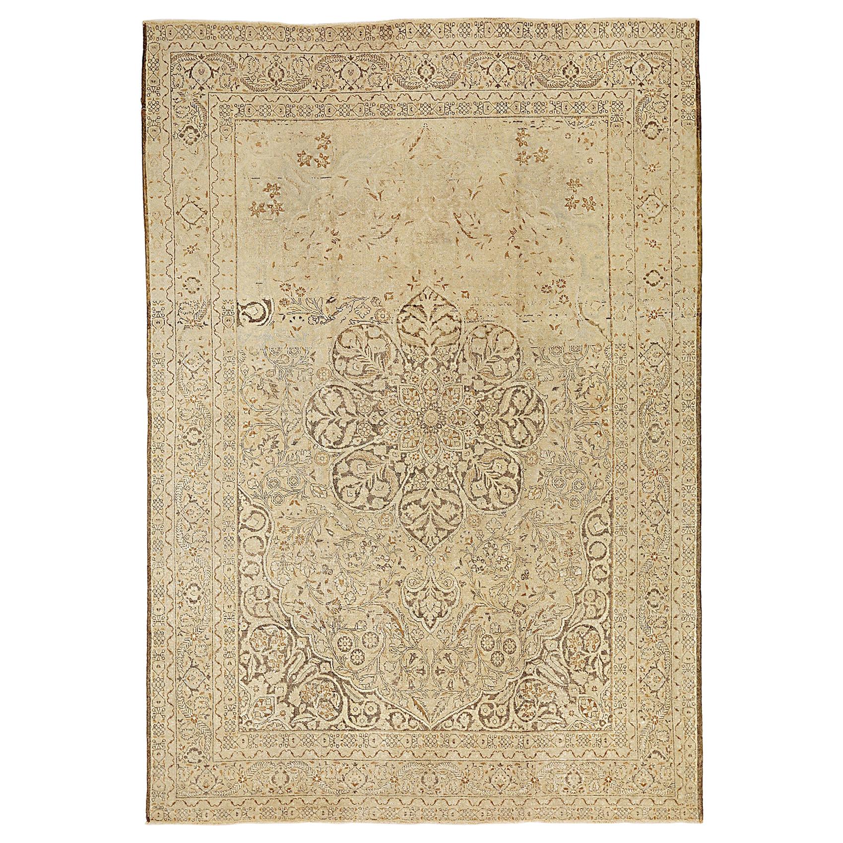 20th Century Antique Persian Tabriz Rug with Black & Brown Flower Motifs For Sale