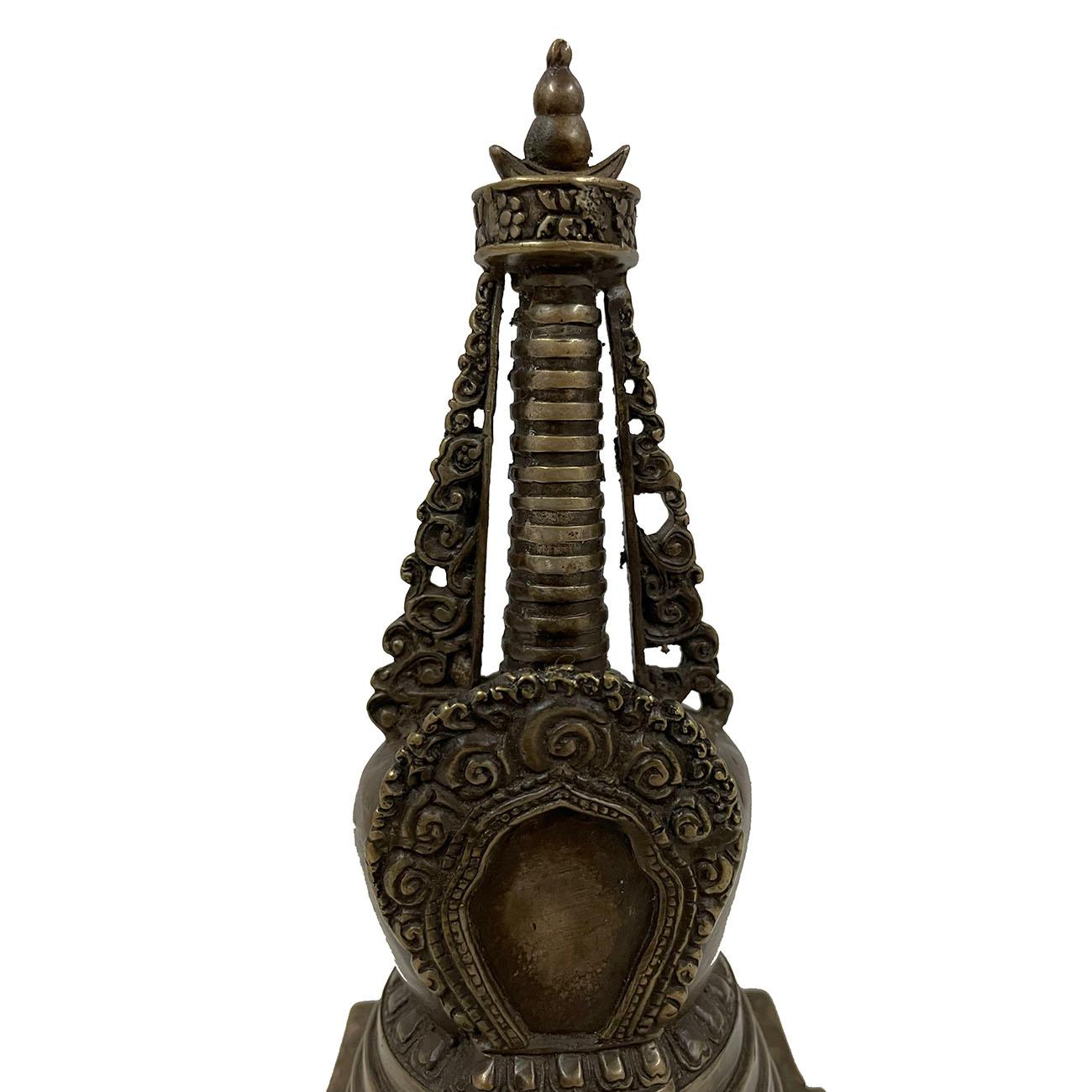 This is handcrafted Tibetan bronze Buddha Pagoda. It has detailed handcrafted Tibetan traditional design. Was used to store Buddha's/Monk's Sherizi. Look at the pictures, fine craftsmanship and sturdy construction made it a beautiful home decor or