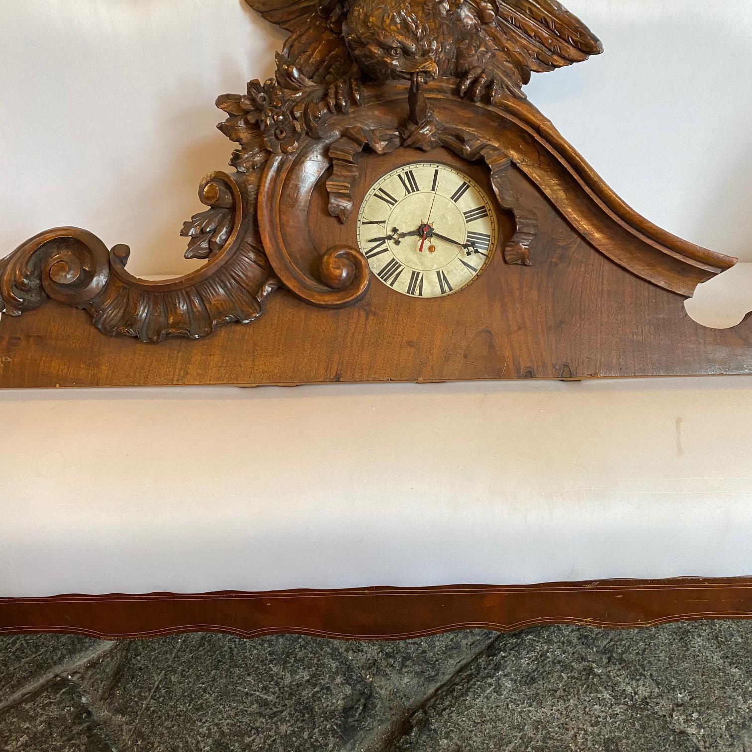 A 20th Century Antique wooden frieze with eagle and clock hand-carved in Italy, original conditions