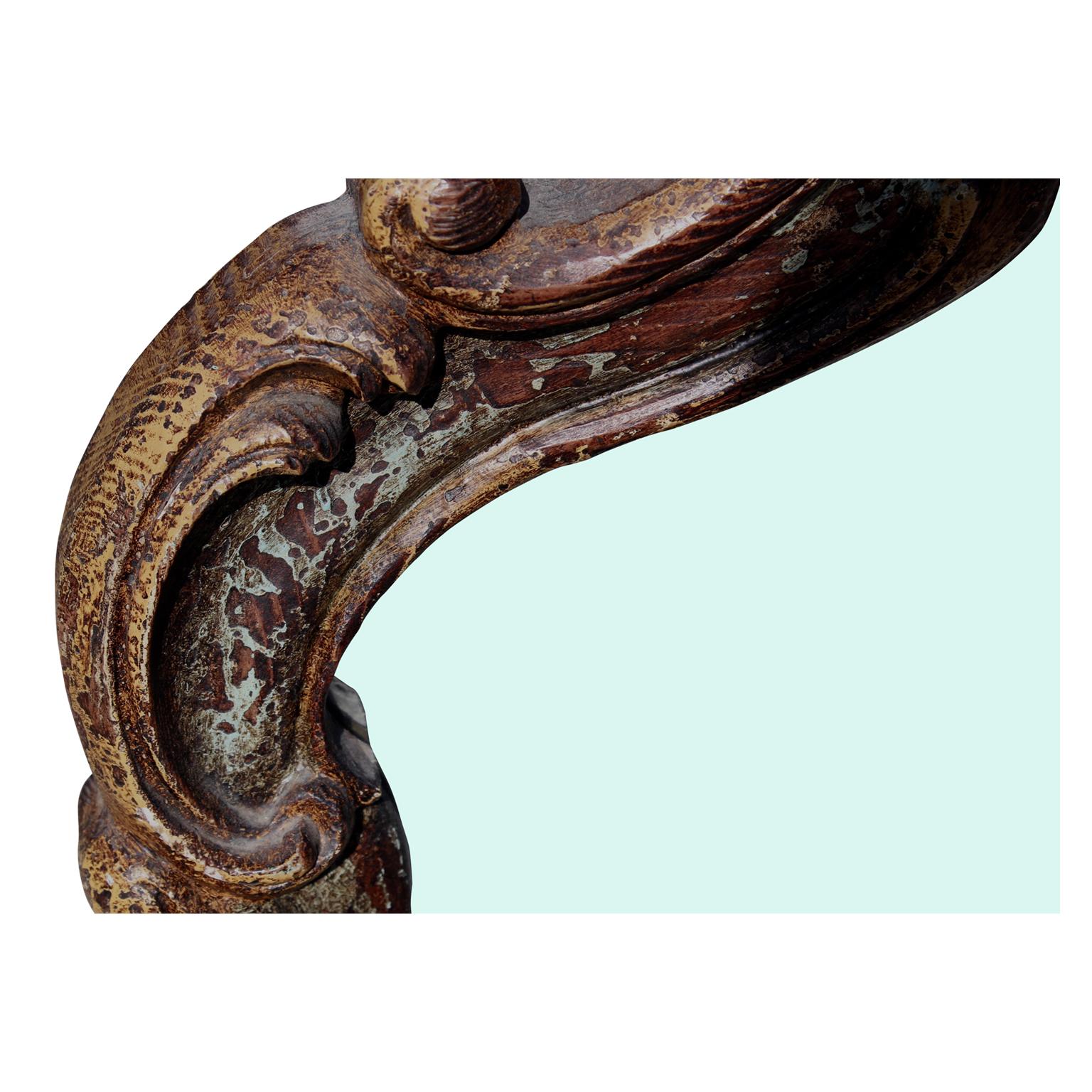 Beautiful antiqued 20th century Italian scroll mirror in the style of the Baroque Era.

Mirror H 41