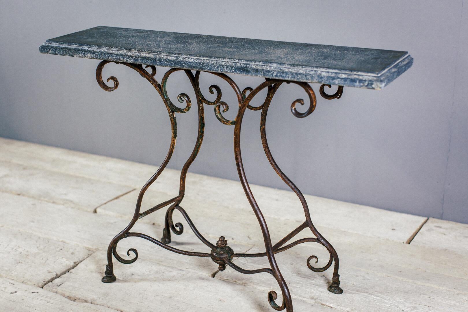 Wrought and cast iron Arras Foundry jardinière base, with original makers mark and original distressed finish. Combined with a later faux slate painted timber top, making a wonderful console table.

   