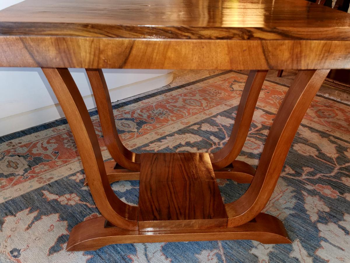  20th century Art Deco French rectangular side table in walnut. It manufactured France in 1935.  NOTICE: DUE TO THE CURRENT  COVID-19 SITUATION, THE SHIPPING OF ITEMS MAY BE SLIGHTLY DELAYED. HOWEVER, ALL OF OUR ITEMS ARE AVAILABLE, WE ARE ALSO OPEN