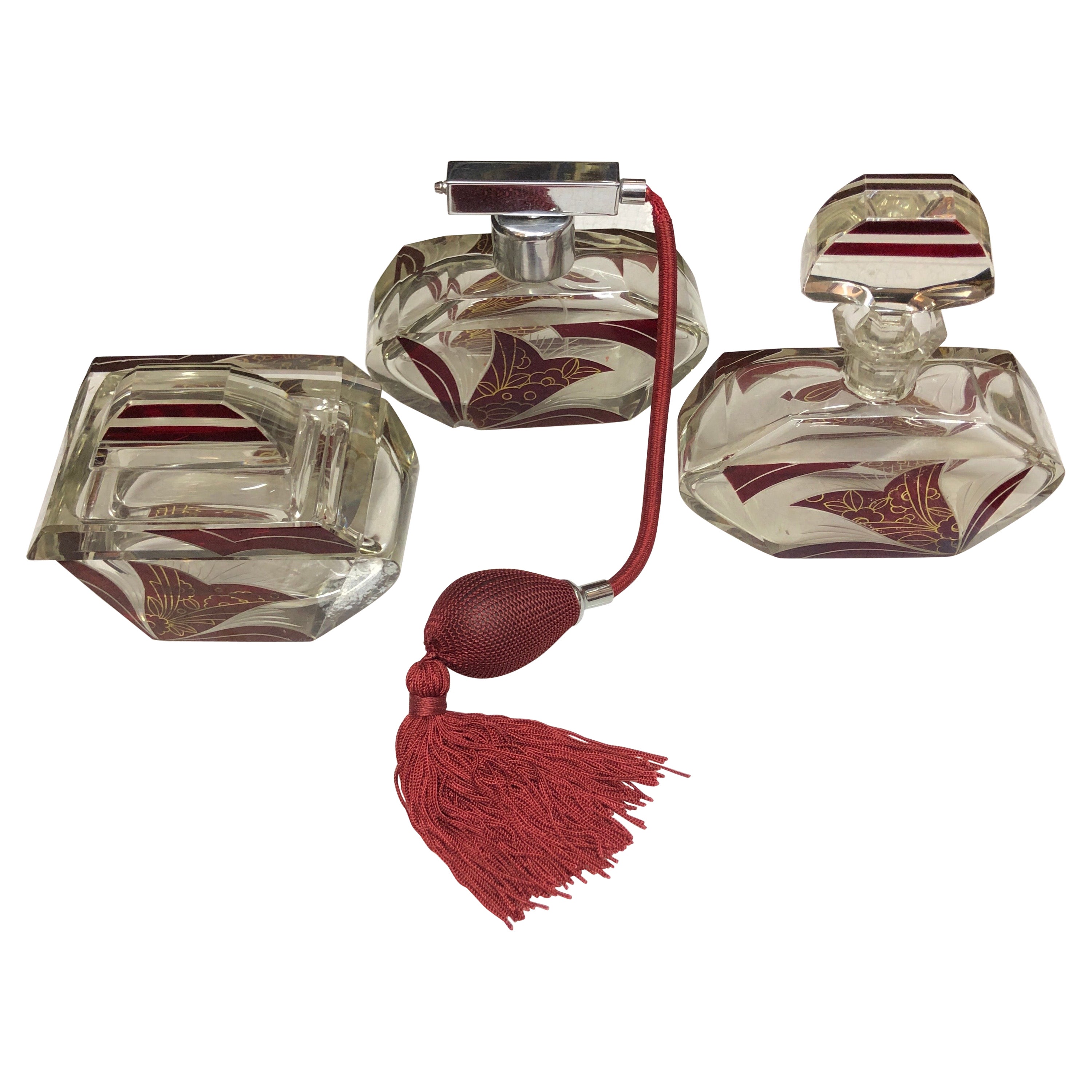 Ensemble de deux bouteilles et récipient à savon en verre Art Déco du 20ème siècle