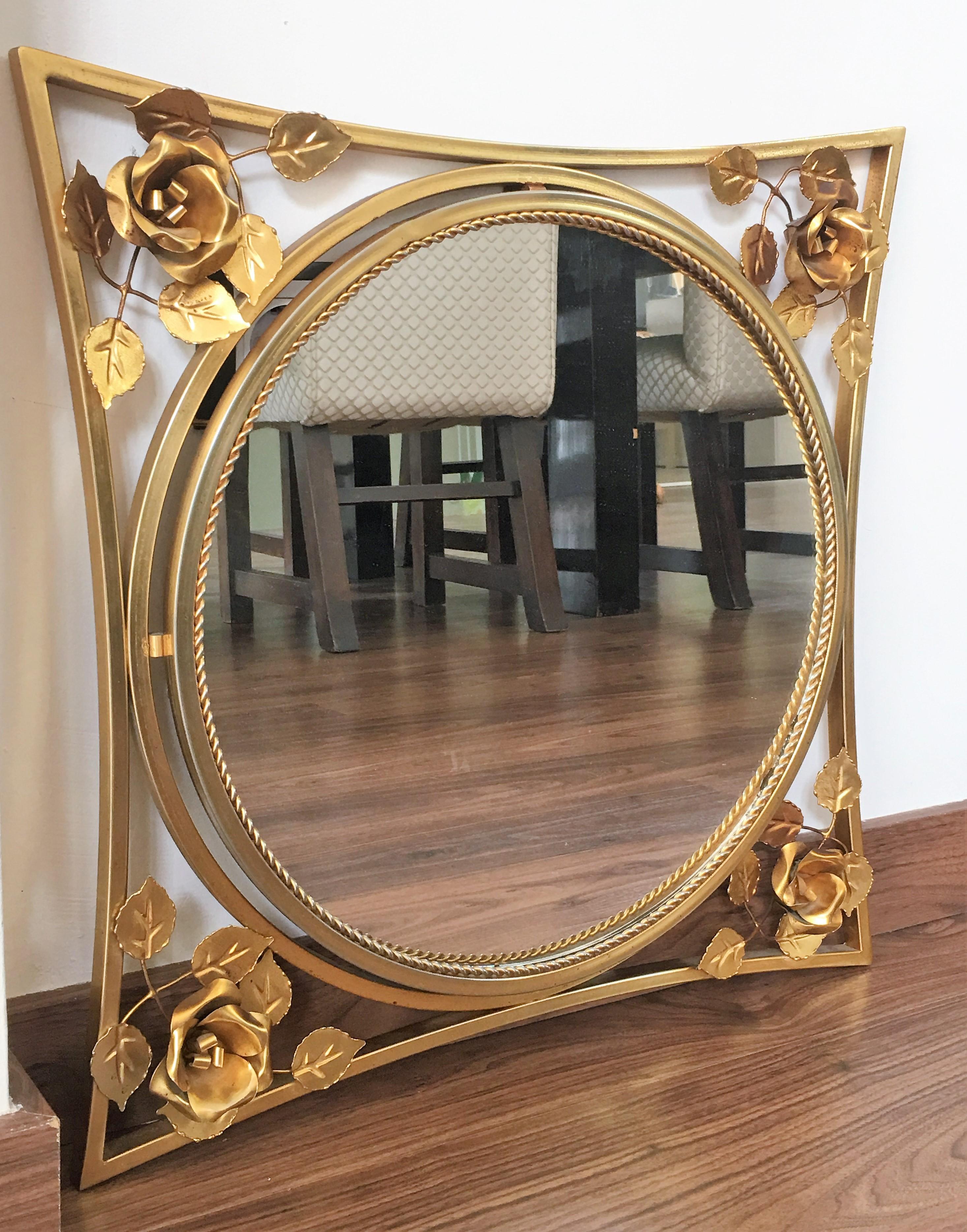 20th century Art Decó gold gilt metal mirror with beautiful corners fleurs.