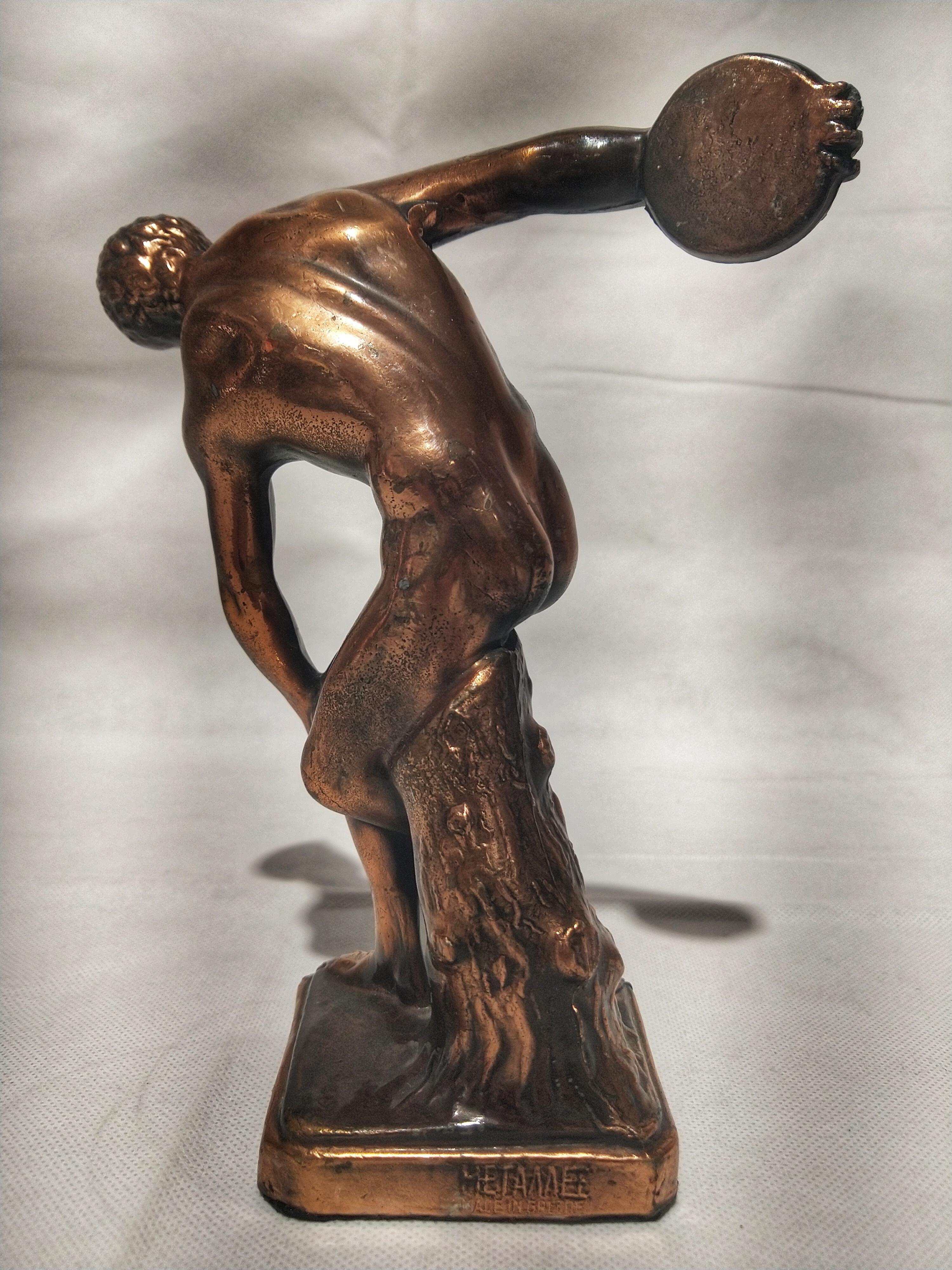 Art Deco bronze figure, reproduction of the famous sculpture.

The Discobolus of Myron is a Greek sculpture completed at the start of the Classical Period, figuring a youthful ancient Greek athlete throwing discus, circa 460–450 BC. The original