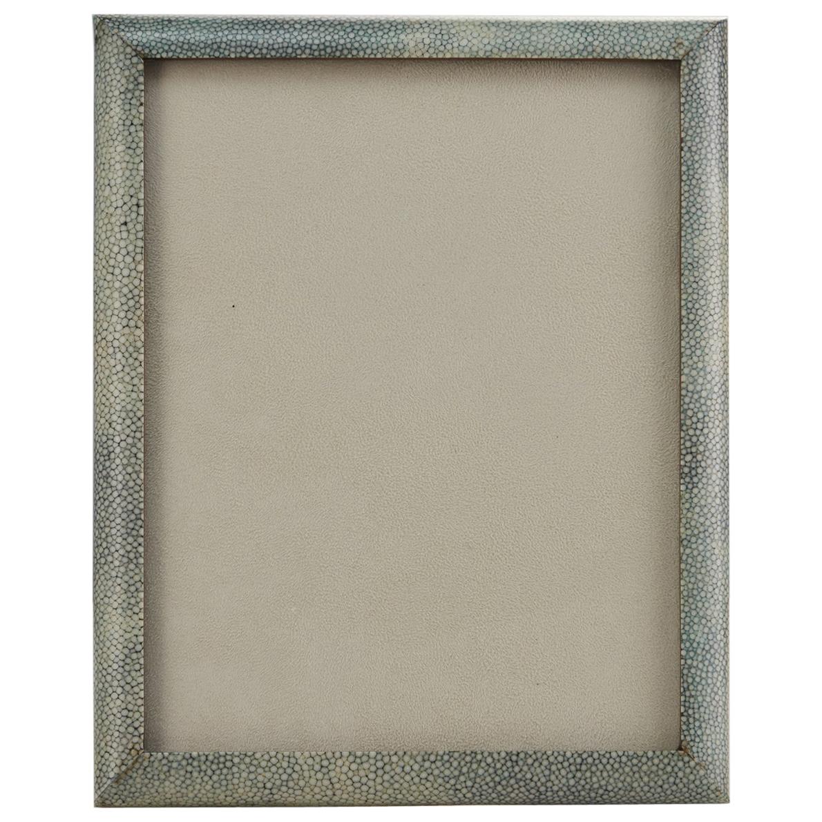 This wonderful 20th Century Art Deco Shagreen photograph frame is in excellent condition with a convex bullnose edge detail, rather than a flat surface.
Photograph frames like this were usually made for quality London stores of the period such as
