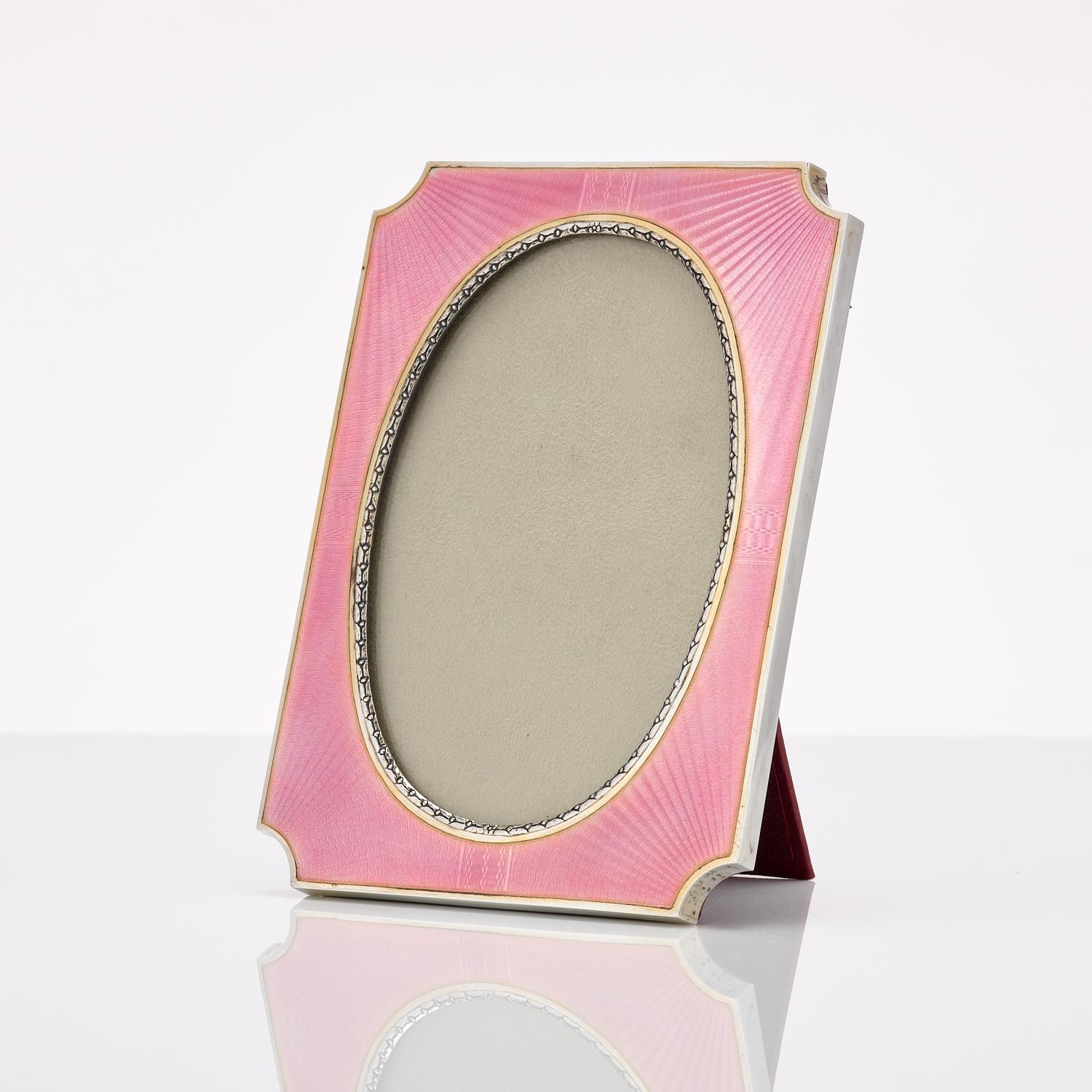 20th century Scandinavian Art Deco silver and Guilloche enamel frame by Marius Hammer date circa 1917-1920.
A beautiful photograph frame in excellent condition and enhanced by the enamel sunburst decoration.
The cast silver is stamped 930 which