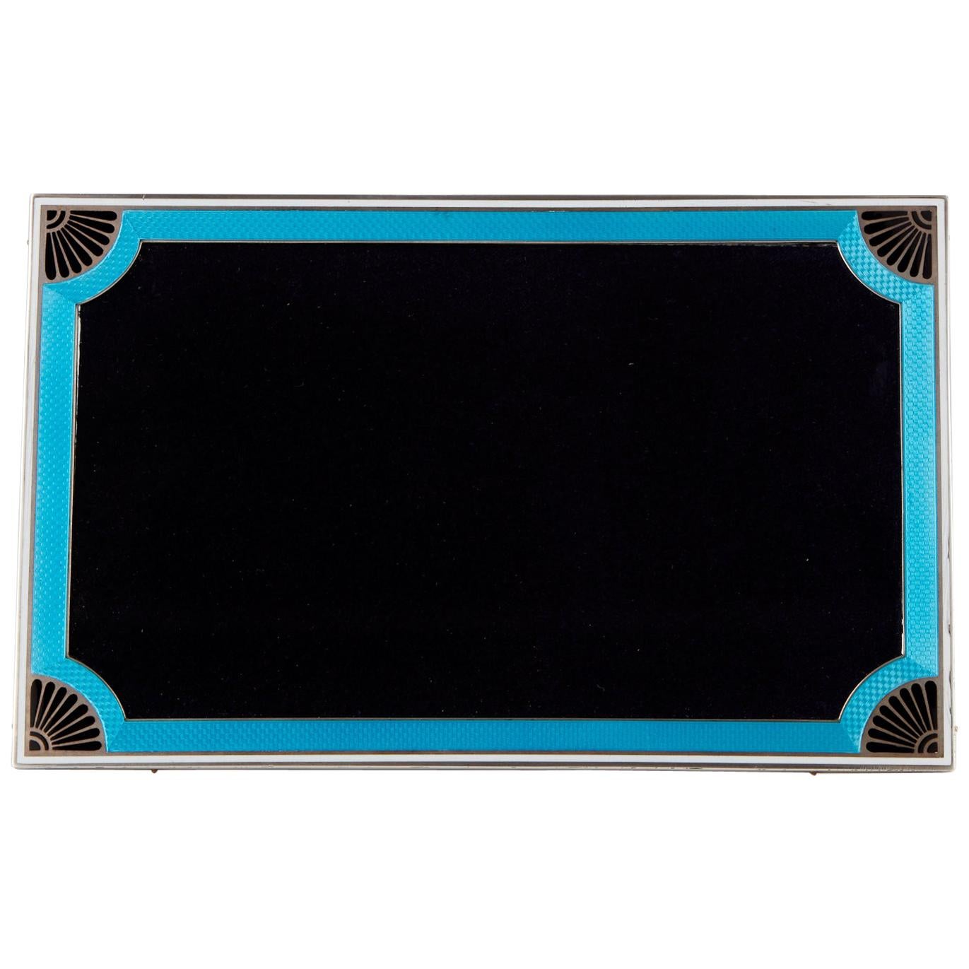 Antique 20th Century Art Deco Silver & Enamel Photograph Frame, circa 1920.

A beautiful heavy cast silver, pure art deco picture frame with applied two colour guilloche enamel.
The underlying colour is aqua marine with applied black enamel