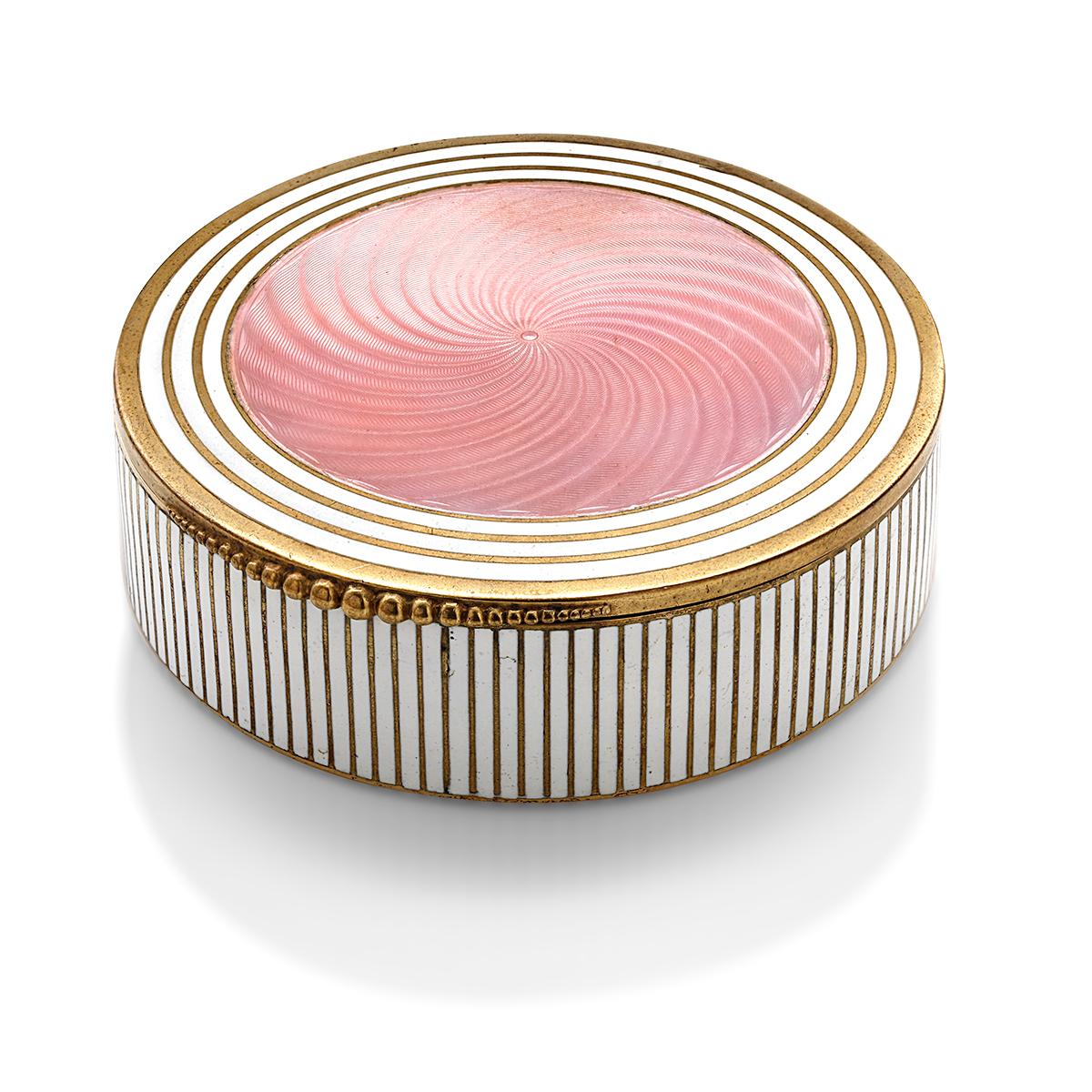 Vintage 20th century Art Deco silver circular pink and gold enamel powder box
Diameter: 3.25