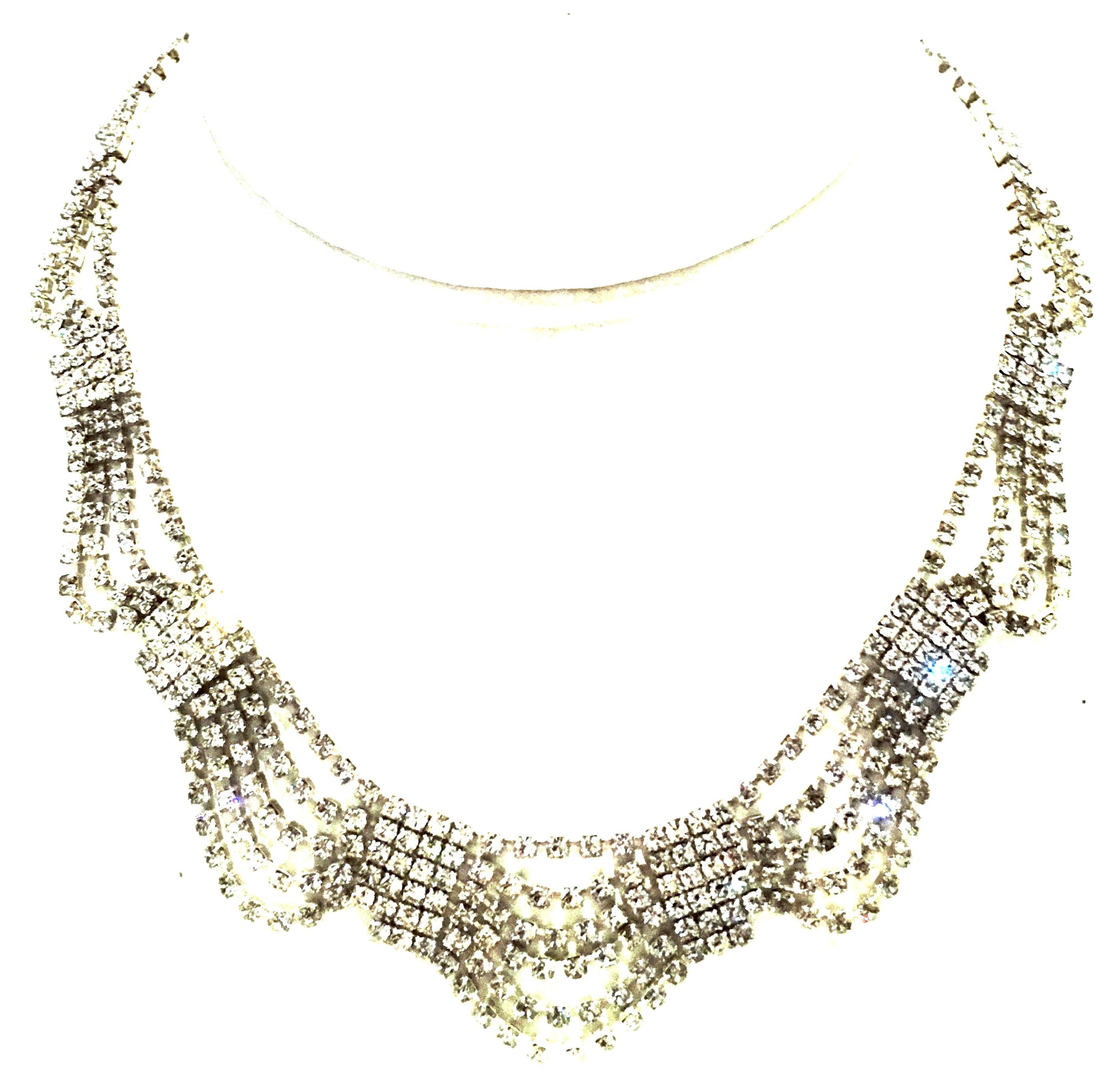 20th Century Art Deco Style Silver Plate & Austrian Crystal Five Row Swag Choker Necklace. Features silver plate metal with brilliant crystal clear round Austrian crystal cut and faceted prong set stones. Fold over box style locking clasp.