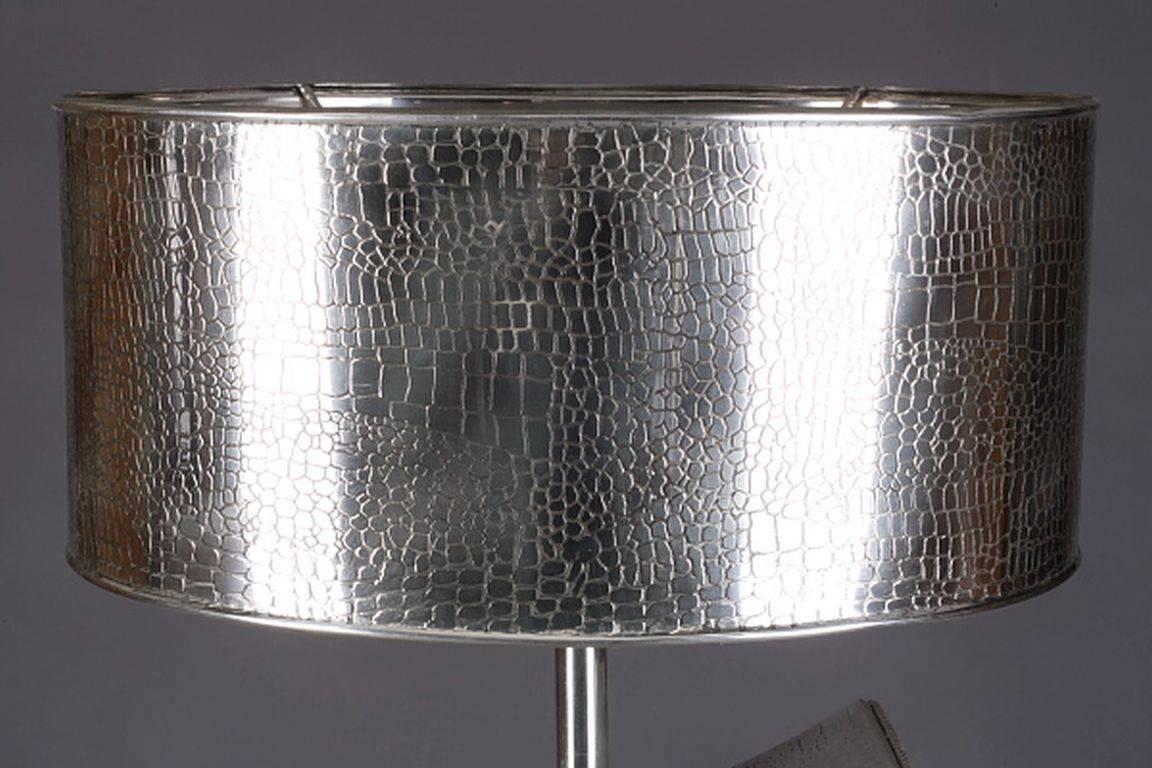20th century Art Deco style table lamp, silver plated
Extravagant table lamp in Art Deco style. Engraved, crocodile shaped. Upper-part from silvered patinated brass. 

Shipping time is around 10-14 weeks

(F-Ra-45).