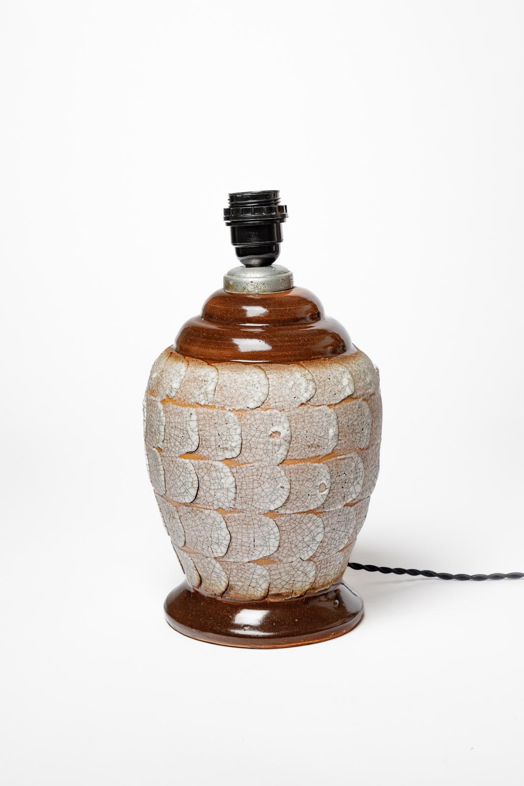 Ceramic 20th century art deco white and brown ceramic table lamp by Louis Dage 1940 For Sale