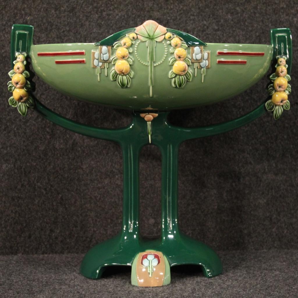 Art Nouveau cup, Austria, Viennese secession, early 20th century. Elegant Eichwald glazed majolica object with serial number 2003 (see photo) richly adorned with Art Nouveau elements such as fruit and whiplash of exceptional quality. Vase for