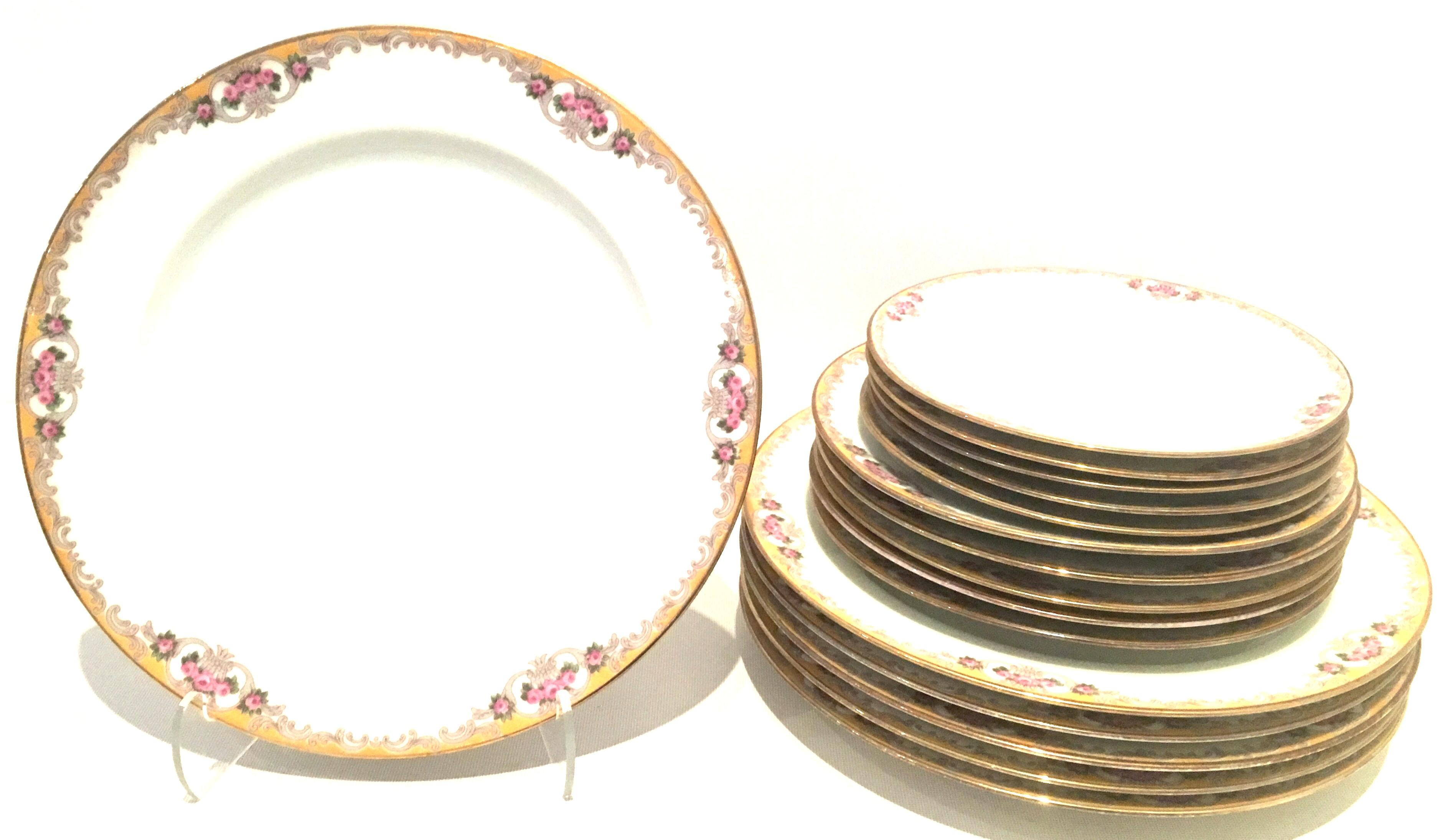 Mid-20th century Art Nouveau limoges France hand painted porcelain and 22-karat gold
Set of seventeen pieces dinnerware set by. M. Redon. This timeless, Classic and coveted pattern features a bright white ground with yellow, pink and green floral