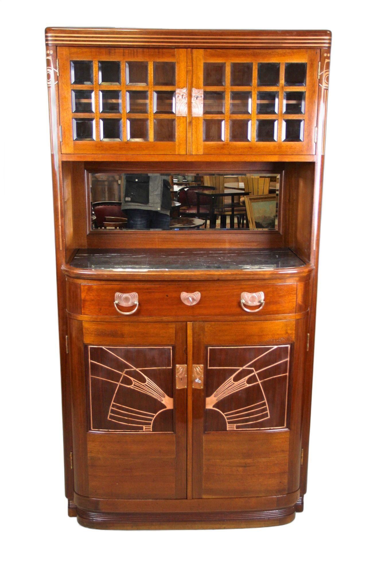 Remarkable 20th century Art Nouveau cabinet or buffet from the period in Austria around 1900. Designed and produced by the famous art furniture factory of August Ungethüm (signed) in Vienna, the fine mahogany buffet stands out with an absolute