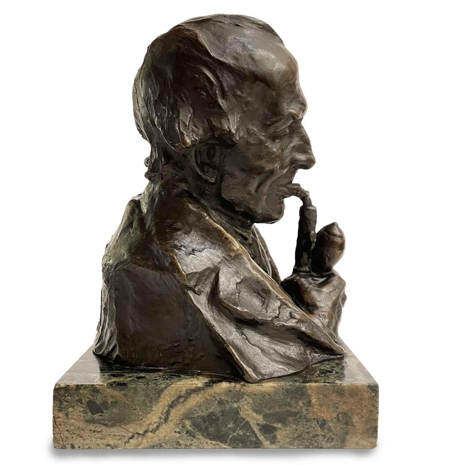 Pipe Smoking Man figure early 20th century Art Nouveau Hans Müller bronze bust, a lovely dark patina figurative sculpture on marble base, signed on the left shoulter H. Müller. In the lower part the bronze figure features a mark with a triangle with