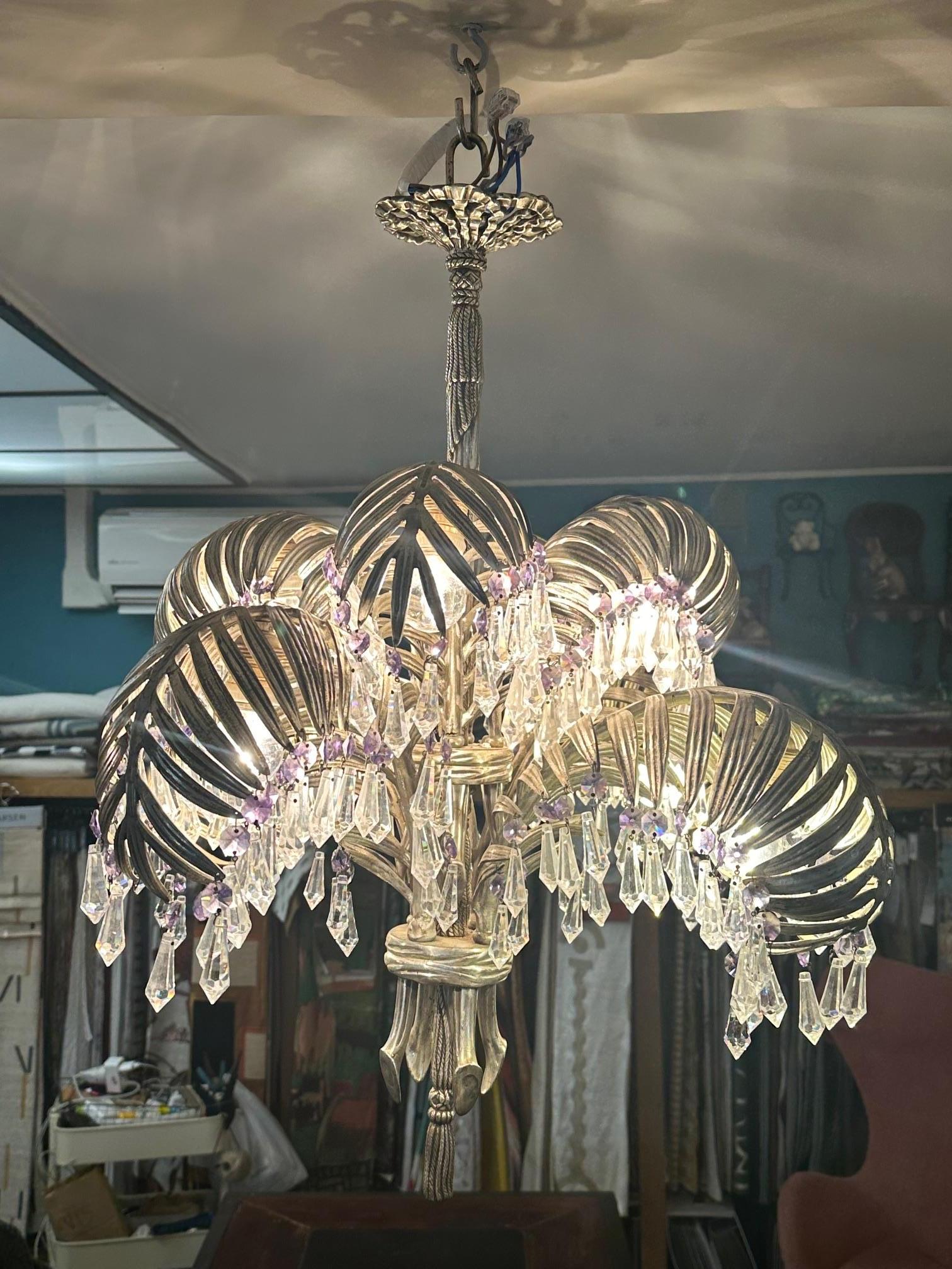 Exceptional palms chandelier made in the art nouveau period with silver bronze and white and purple crystal. 
The central stem represents a trimming. 
Very nice quality and condition (some few crystal pendants are missing). 
Unique and rare piece.