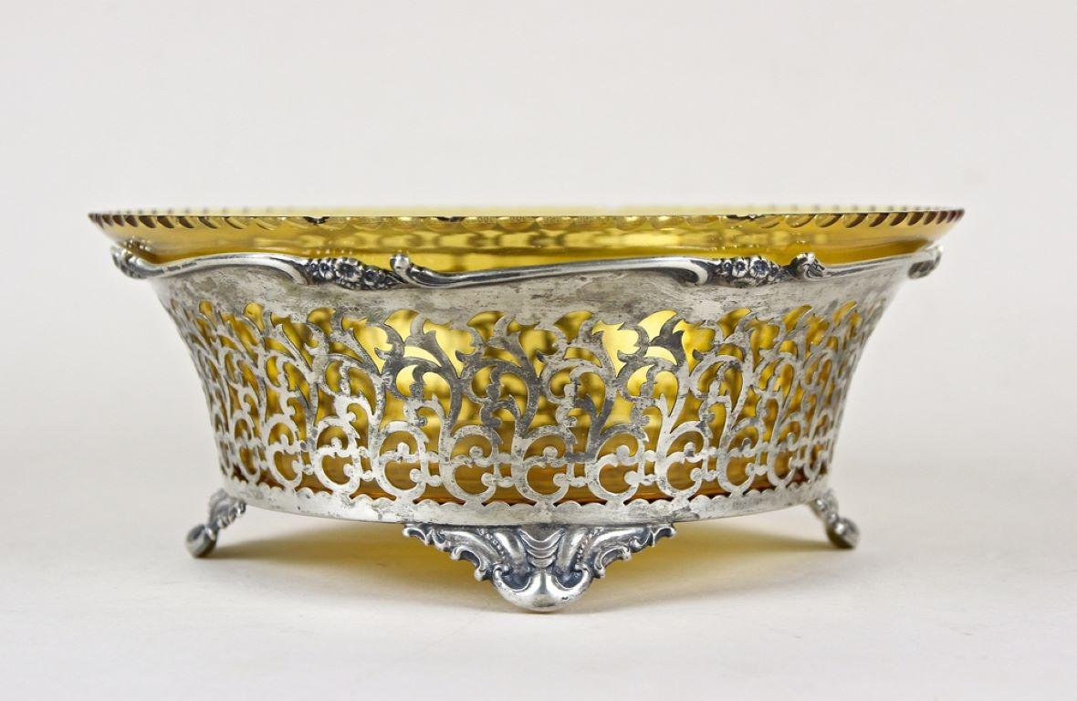 Extraordinary 20th century silver bowl or centerpiece from the early Art Nouveau in Austria around 1900. An artfully crafted, open worked silver basket made of 240,6 gramm of fine solid 800 silver (hallmarked). The exceptional design shows an