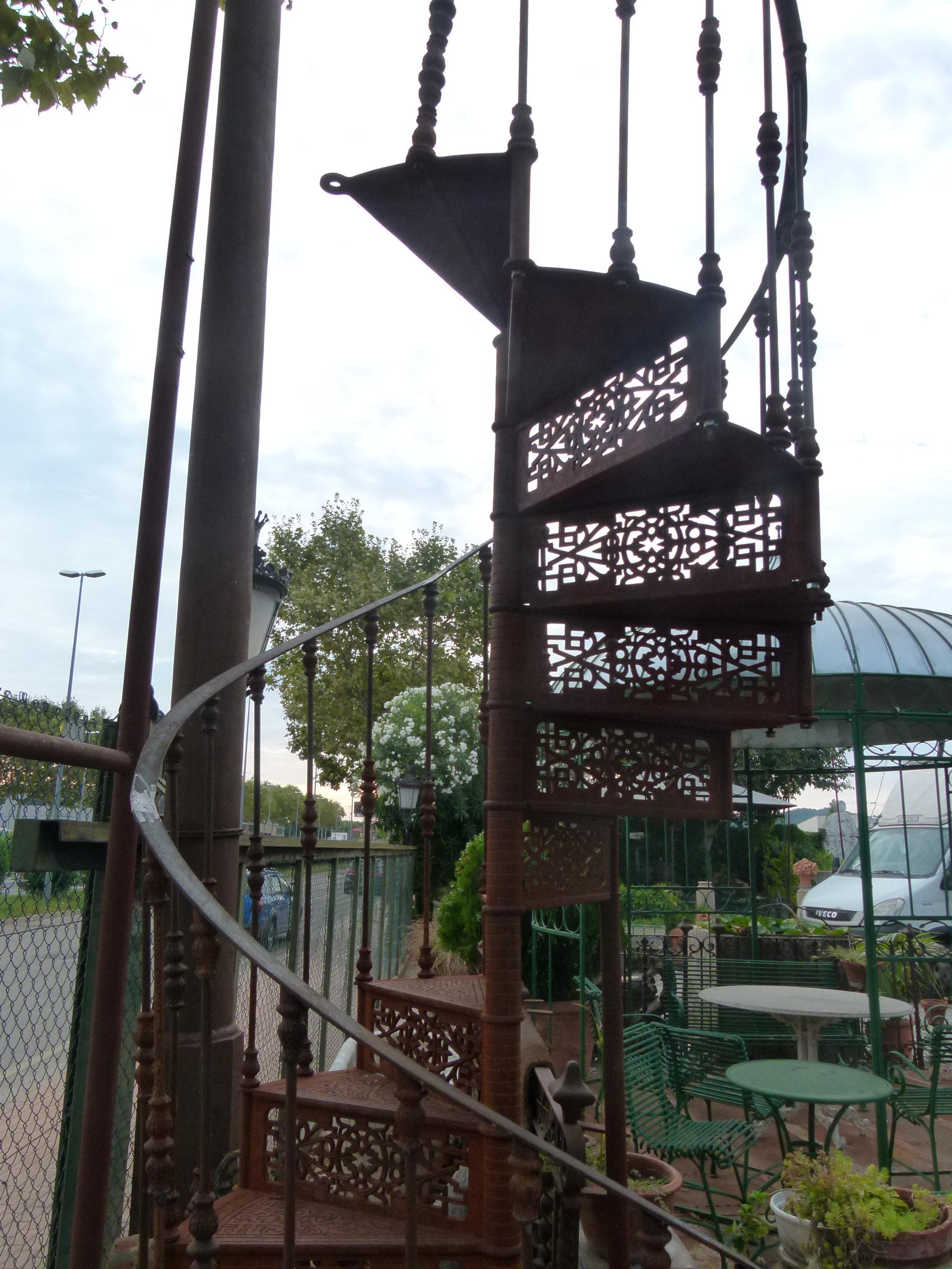 20th century Art Nouveau style spiral staircase from Spain in good condition and easy to assemble. 

This stair belonged to an old Factory in Spain, that closed at the end of the 20th century. 
The rail was missing and added new recently. Steps are