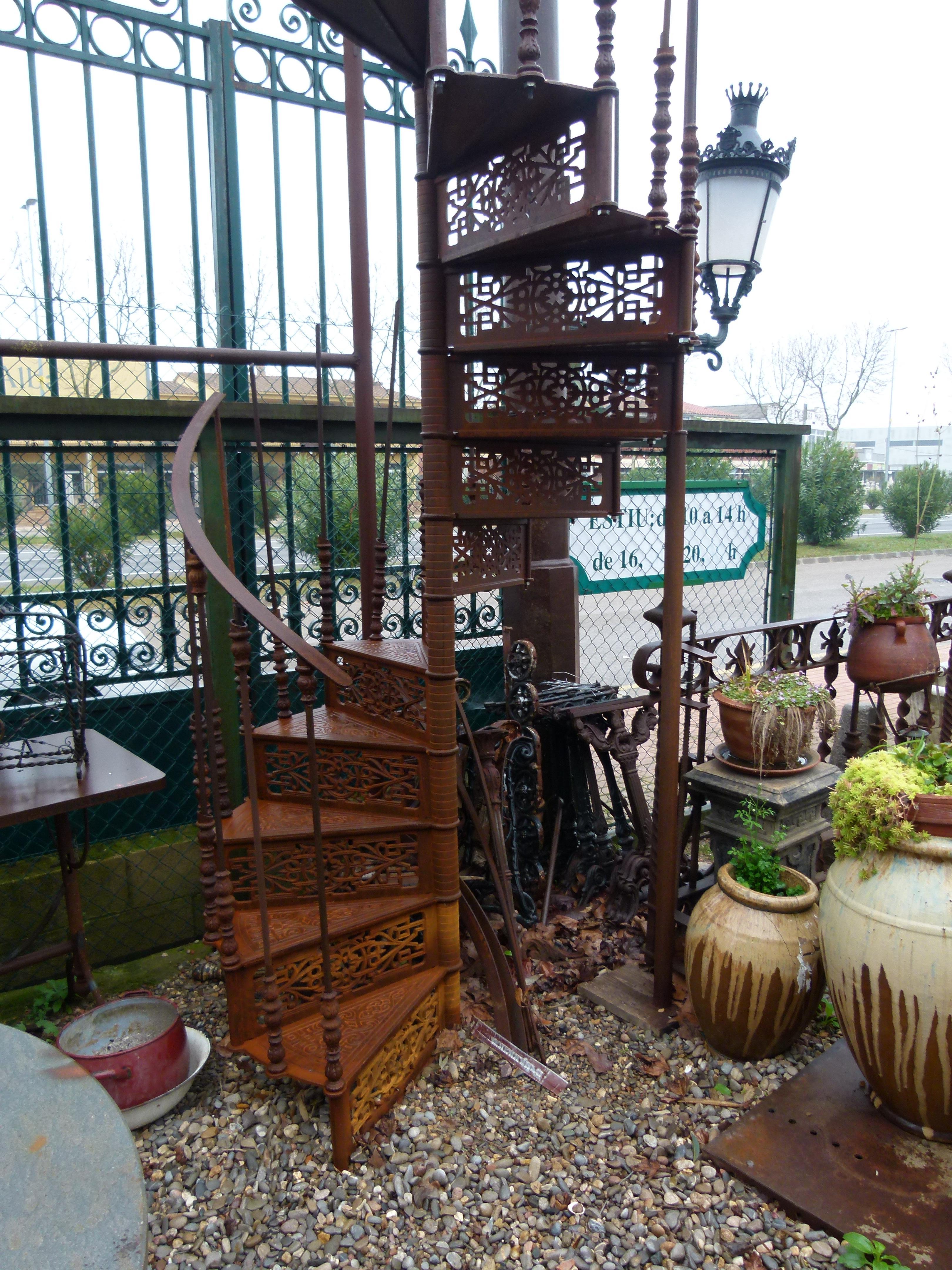 20th Century Art Nouveau style spiral staircase from Spain in good condition and easy to assemble. 

This stair belonged to an old Factory in Spain, that closed at the end of the 20th century. 
The rail was missing and added new recently. Steps