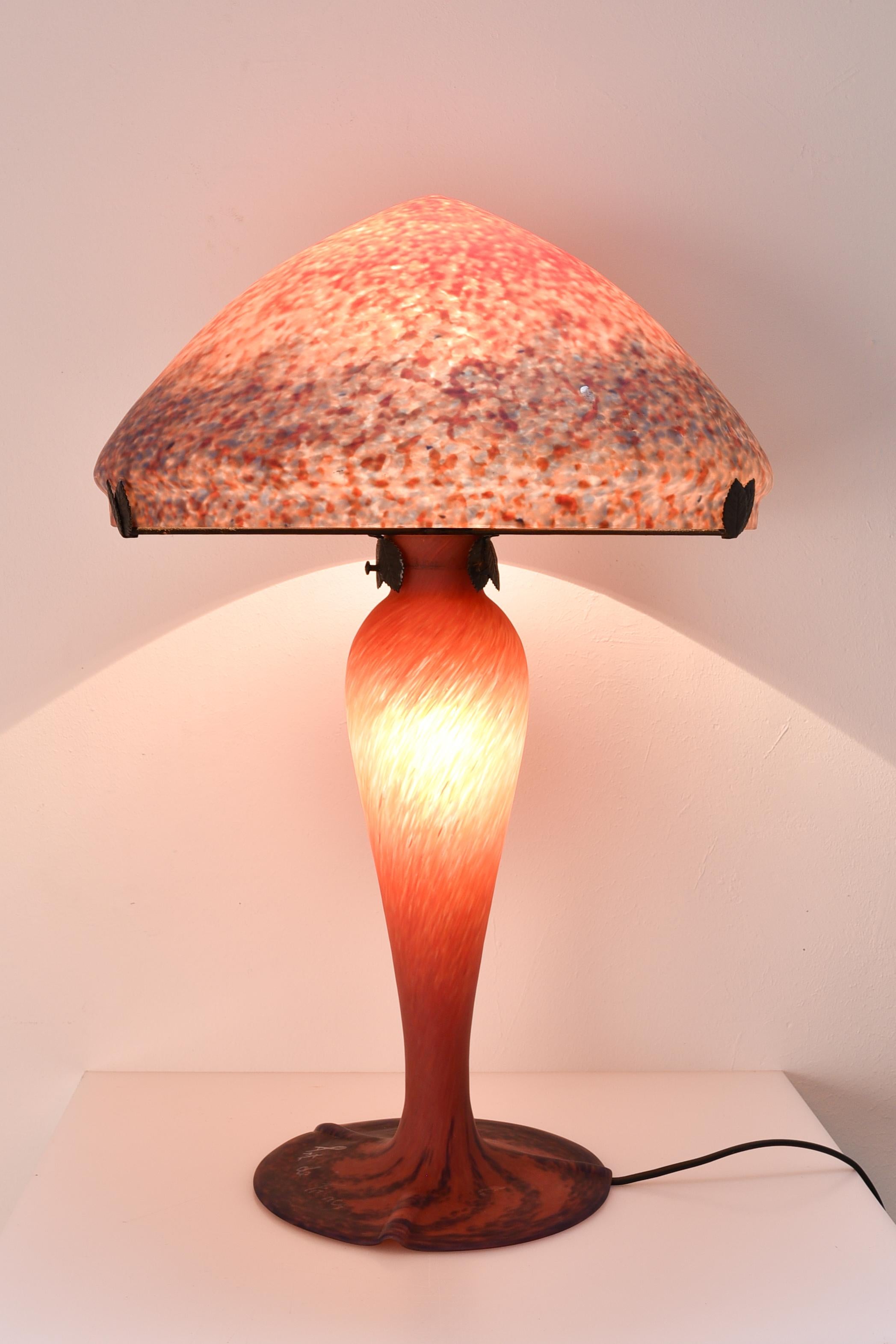 French 20th century art Nouveau table lamp by Art de France in orange and violet glass