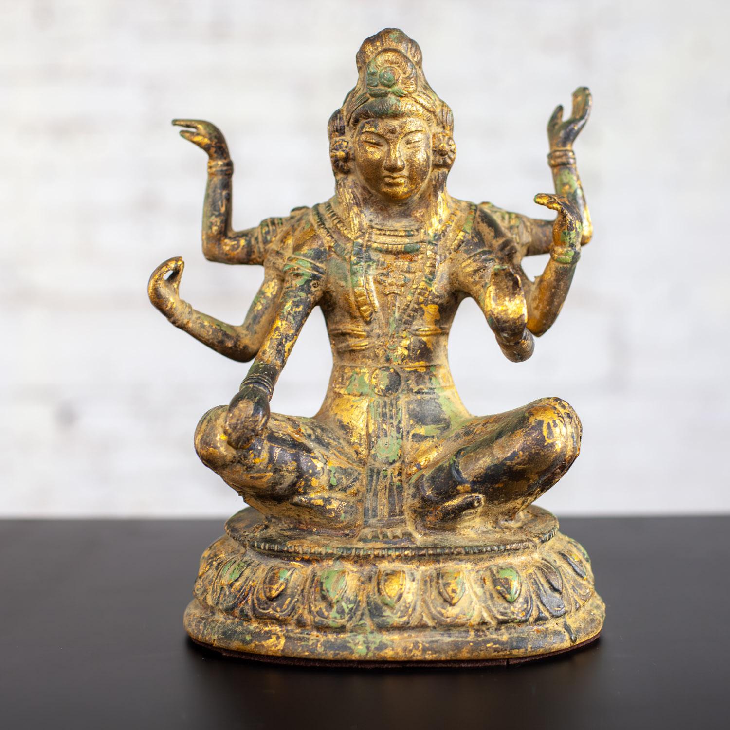 Marvelous 20th Century Asian gilded & patinated cast iron 6-Armed Deity Vasudhara Buddhist sculpture. Beautiful condition, keeping in mind that this is vintage and not new so will have signs of use and wear even if it has been refinished or