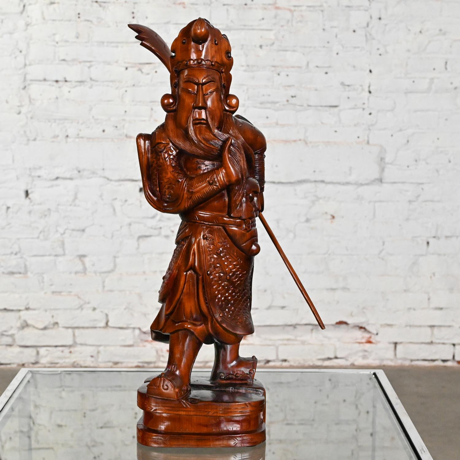 Handsome vintage Asian Chinoiserie rosewood Guan Yu or Chinese warrior hand carved larger scale sculpture. Beautiful condition, keeping in mind that this is vintage and not new so will have signs of use and wear. Please see photos and zoom in for