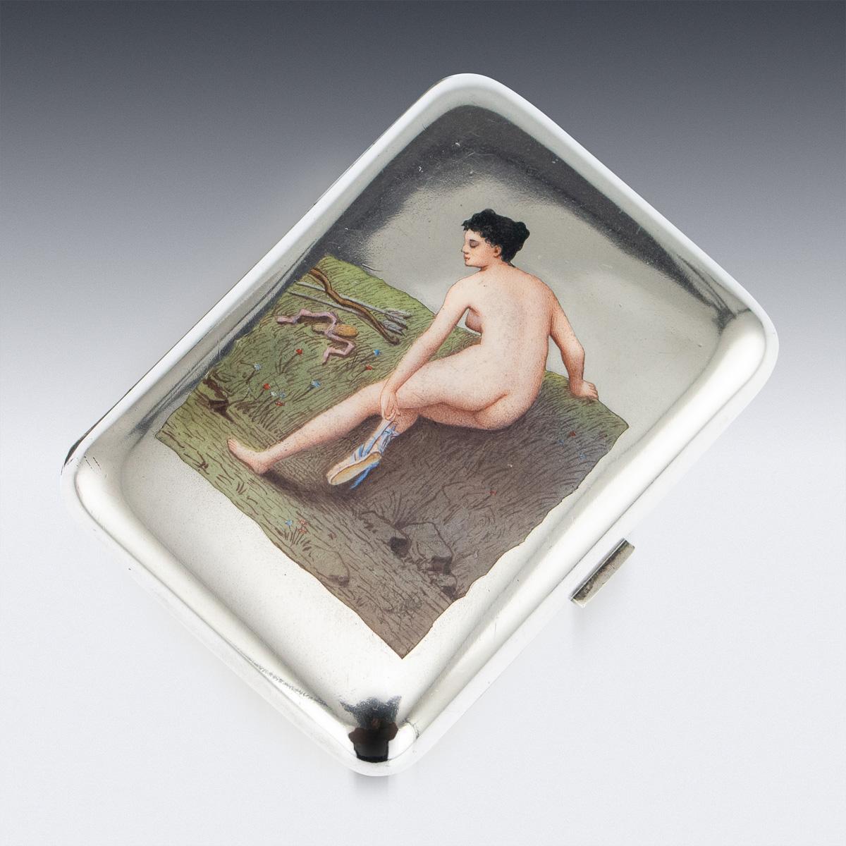 Antique early 20th century Austrian risqué solid silver and enamel cigarette case, of rounded rectangular form, the surface of one side applied with a hand painted, multicolored and shaded enamels depicting Artemis undressing by the edge of a river,