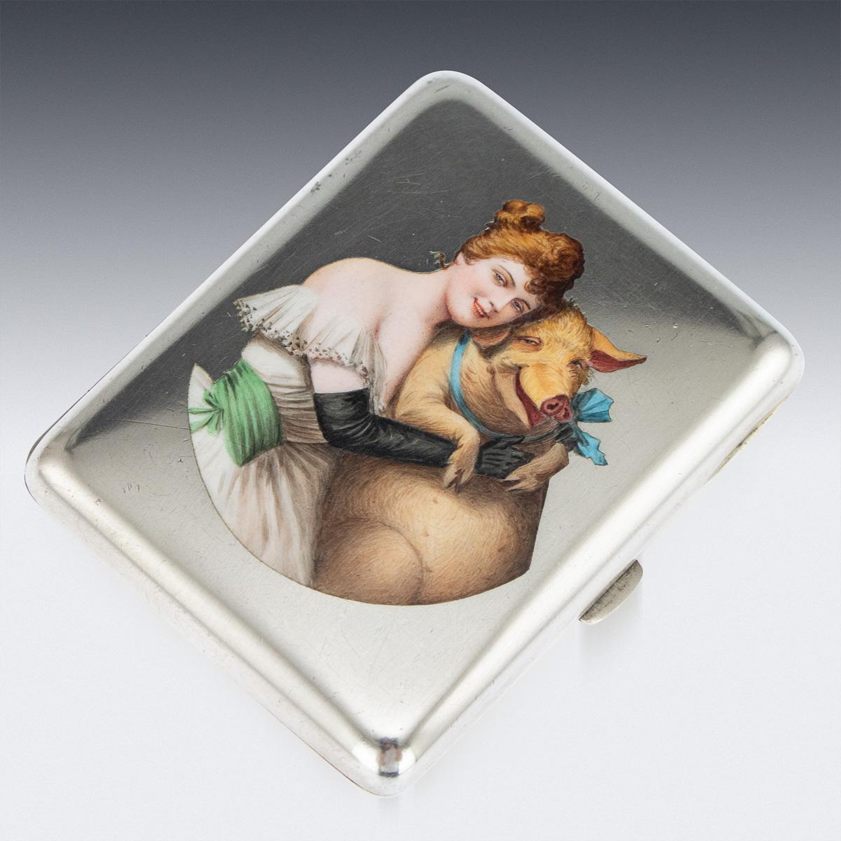 Antique early 20th century Austrian novelty solid silver & enamel cigarette case, of rounded rectangular form, the surface of one side applied with a hand painted, multicolored and shaded enamels depicting a beautiful girl embracing a jolly pig with
