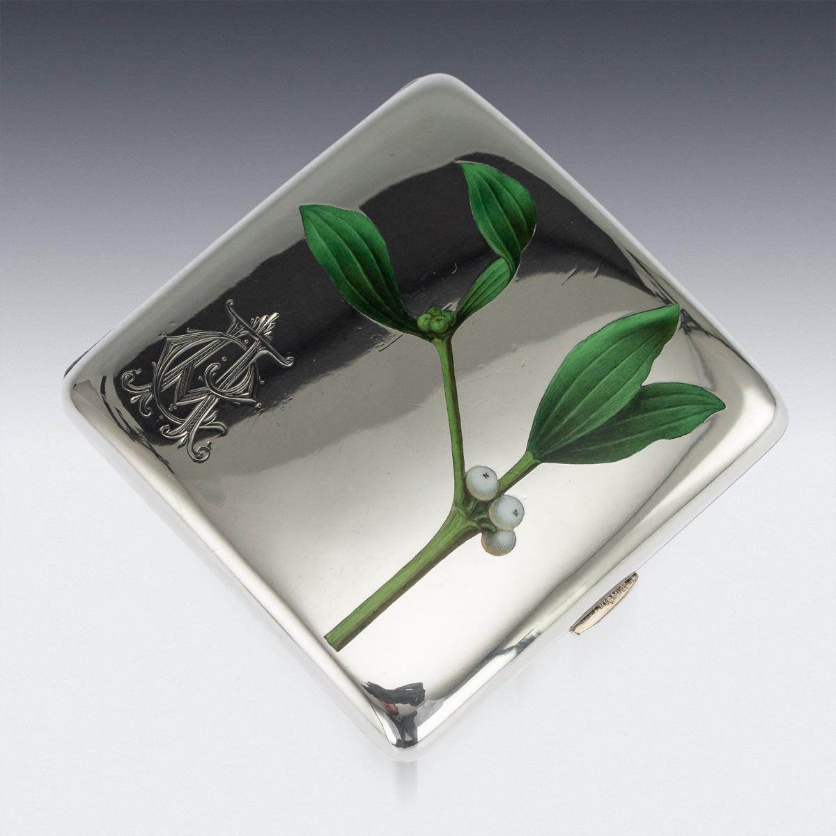Antique early-20th century Austrian solid silver & enamel cigarette case with vesta, of rounded rectangular form, the surface of one side applied with a hand painted enamels depicting dogwood, engraved with initials, the reverse is plain, the inside