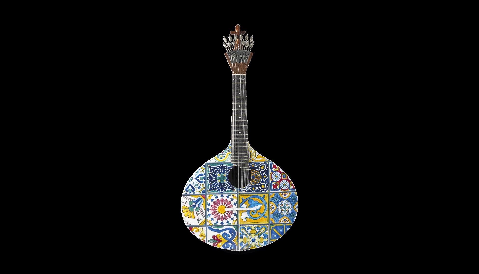 The Azulejo I Portuguese guitar is a tribute to the artistic expression of a nation. The history of the people is transcribed to the original ceramic pieces, painted in contrasting colors, which decorate the walls of the seaside country: the tiles,