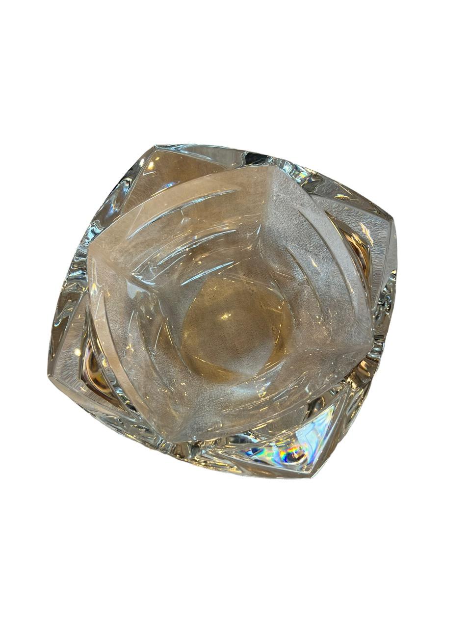 20th Century Baccarat crystal objectif clear small bowl. The bowl changes its shape depending on the angle you are appreciating it from. Triangular cuts that turn into rhombus, with a square shape with round corners.
 