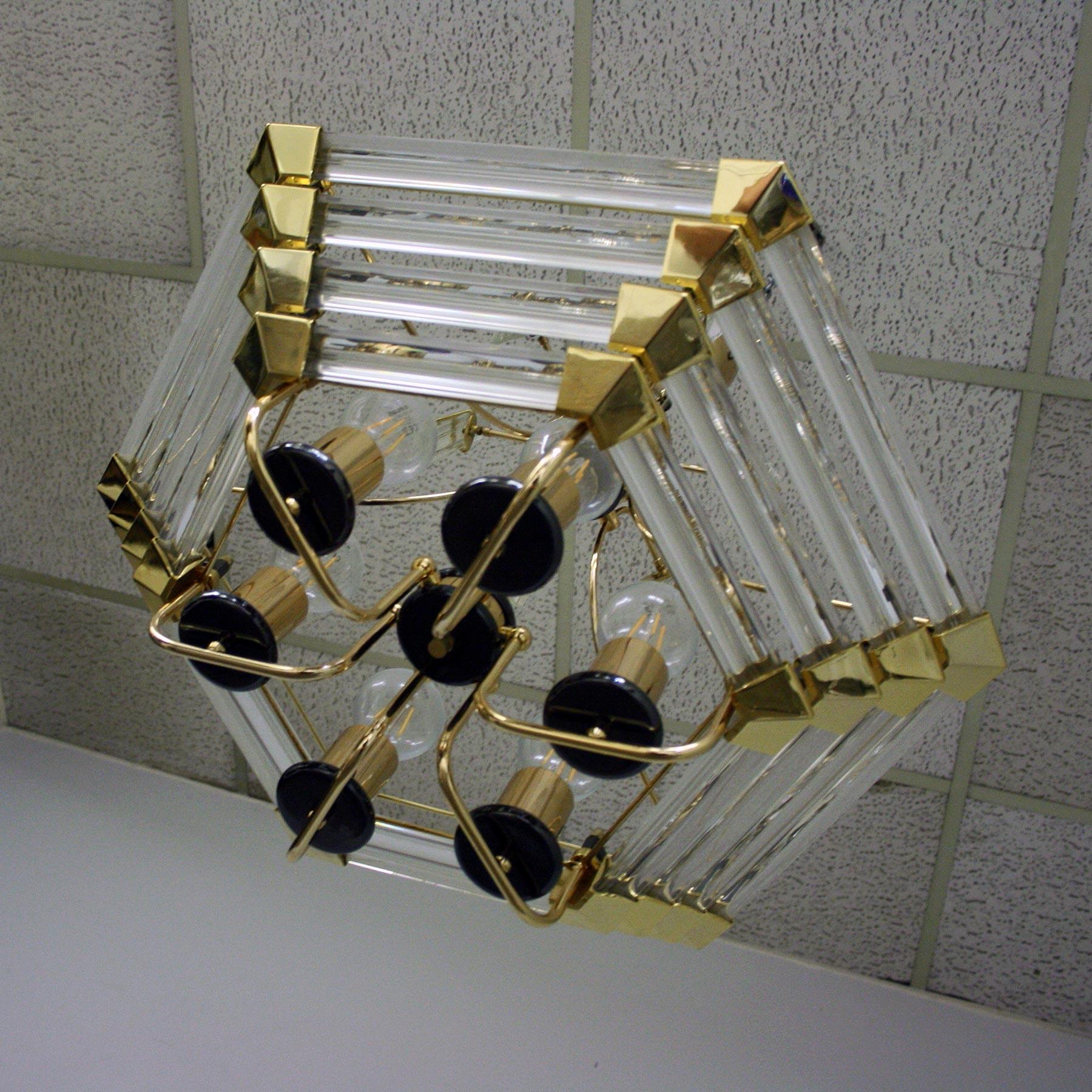A 1980's Brass and glass bakalowits & sohne chandelier, in mint condition.

It was founded in 1845 by Elias Bakalowits. The company became very successful in providing crystal as well as lighting for palaces ad other notable buildings. The