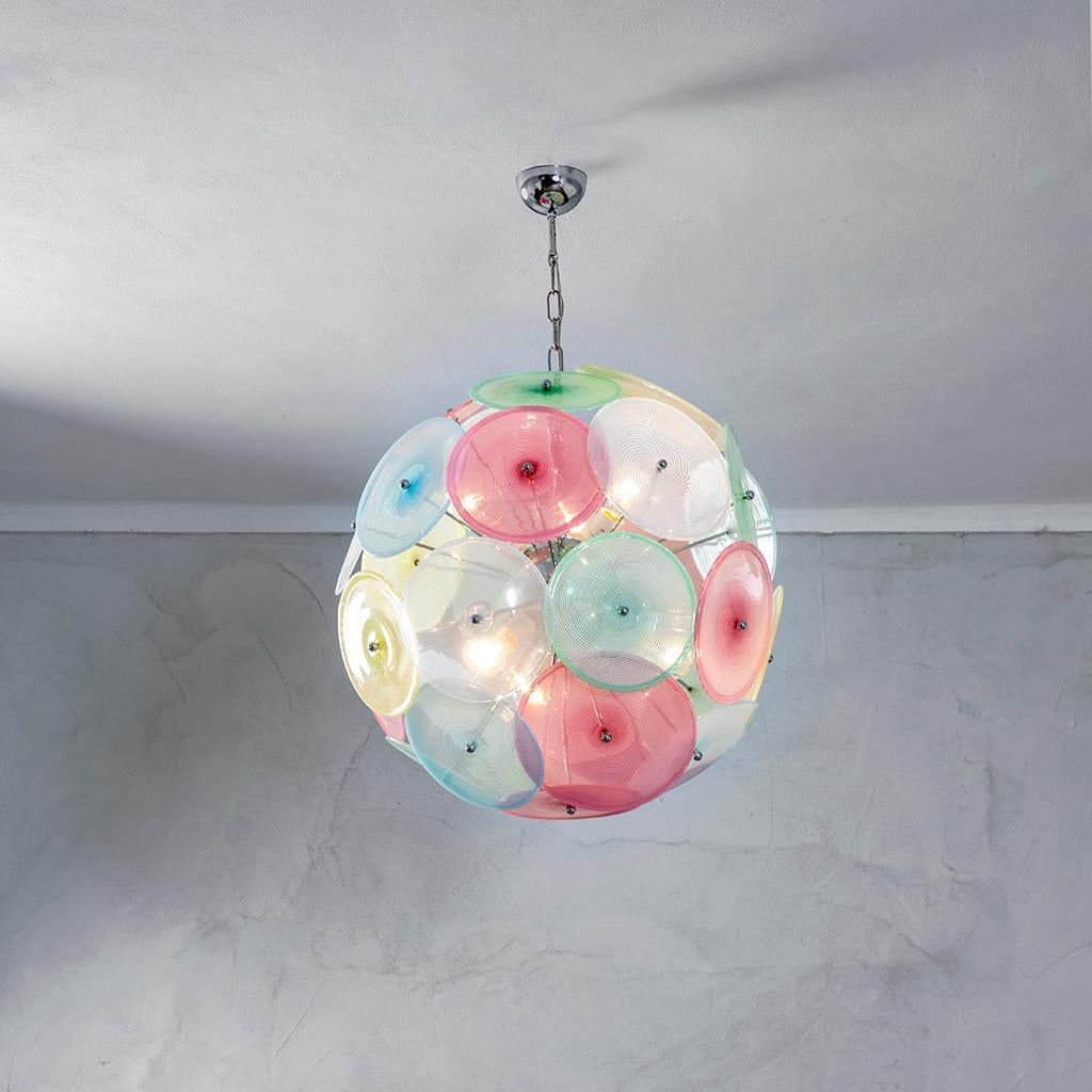 Wonderful Sputnik chandelier designed by Barovier And Toso in '70 for a private client. The chandelier has a structure in chromed metal and it is decorated with different disks in Murano blown-glass. The effect of light is wonderful thanks to the