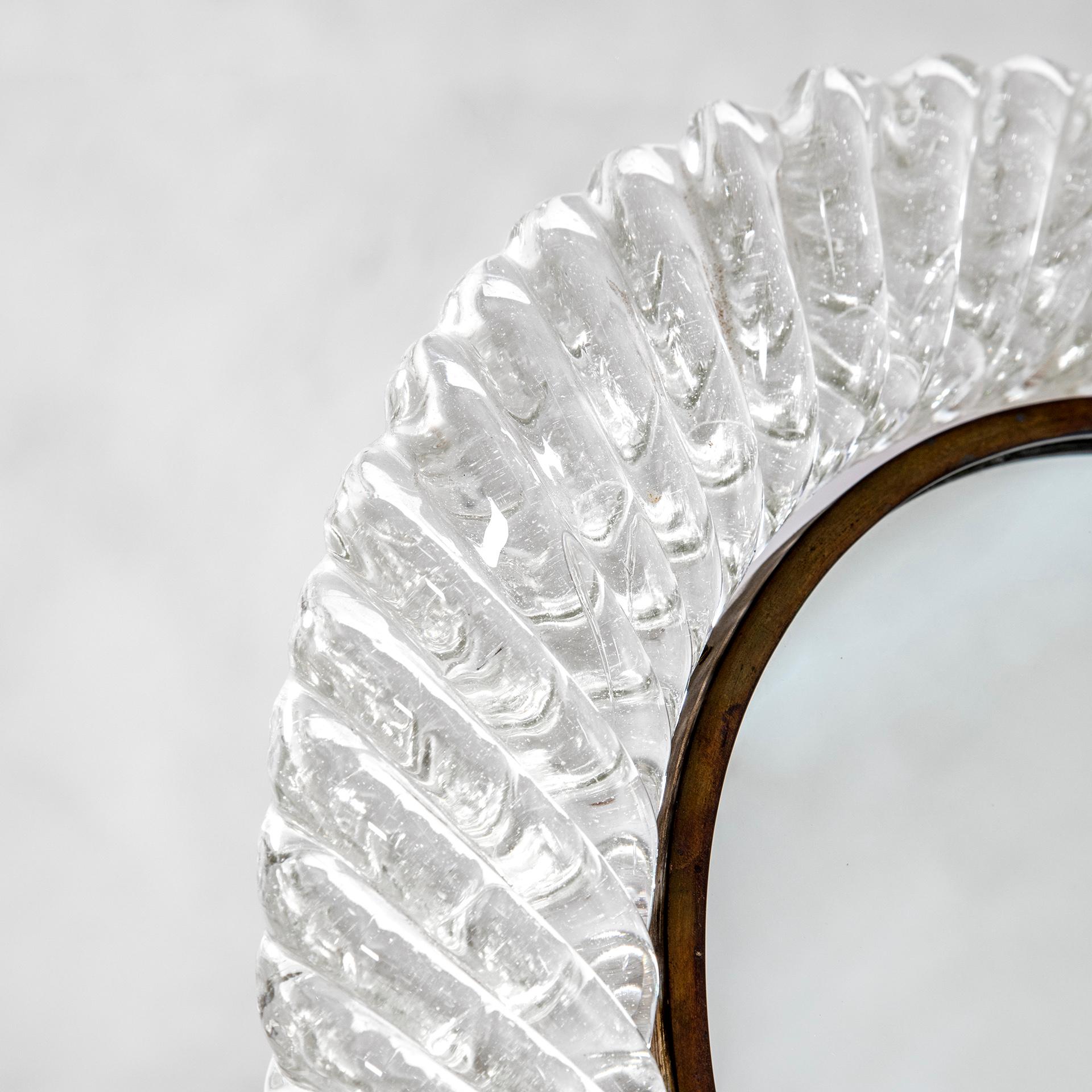 Wodnerful Table mirror designed in '50s by Barovier & Toso, masters of Murano Glass. This mirror has a gorgeous frame entirely in Murano Glass, worked in the way of 