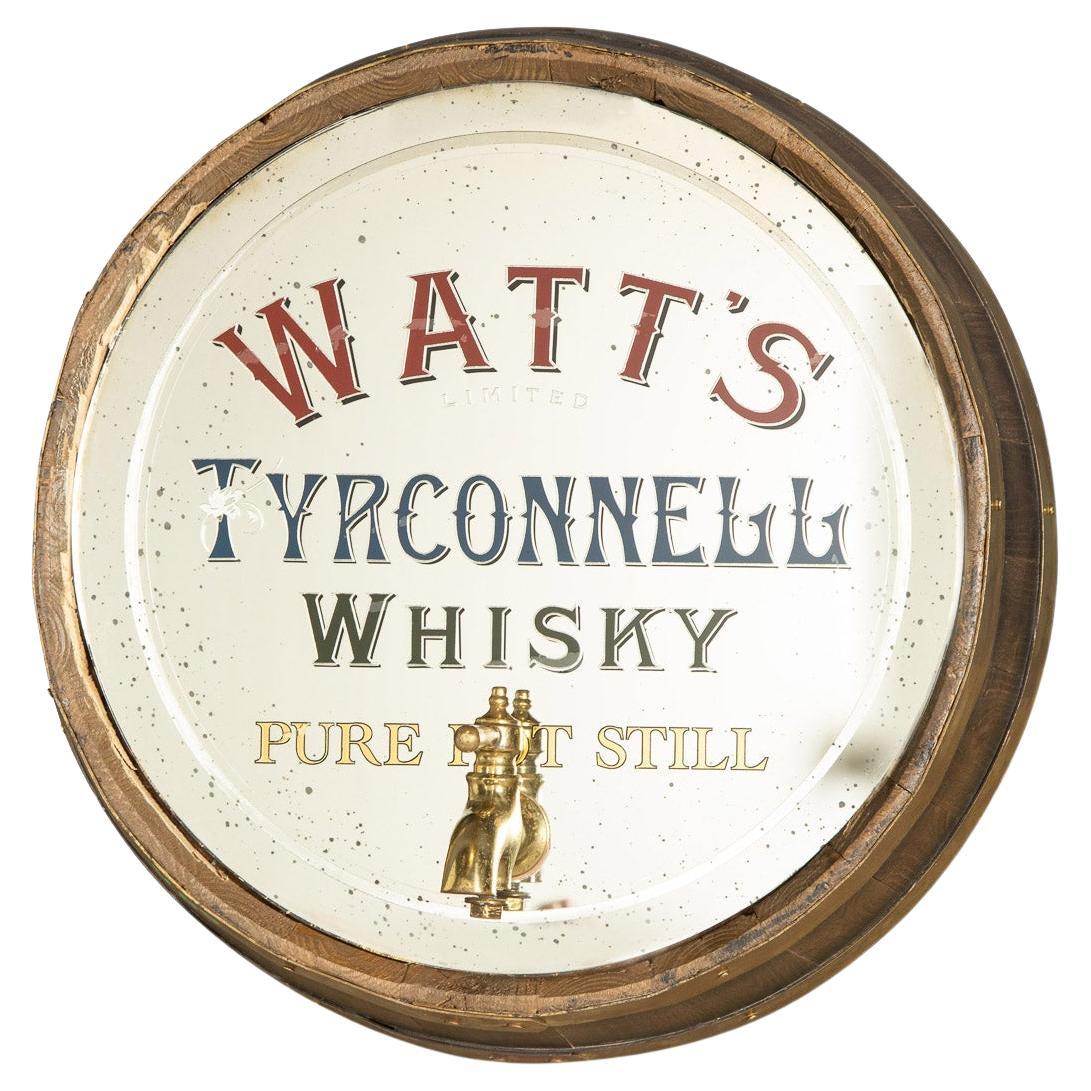 Specchio pubblicitario per whisky Watts Tyrconnell con cornice di botte del XX secolo, 1900 ca.