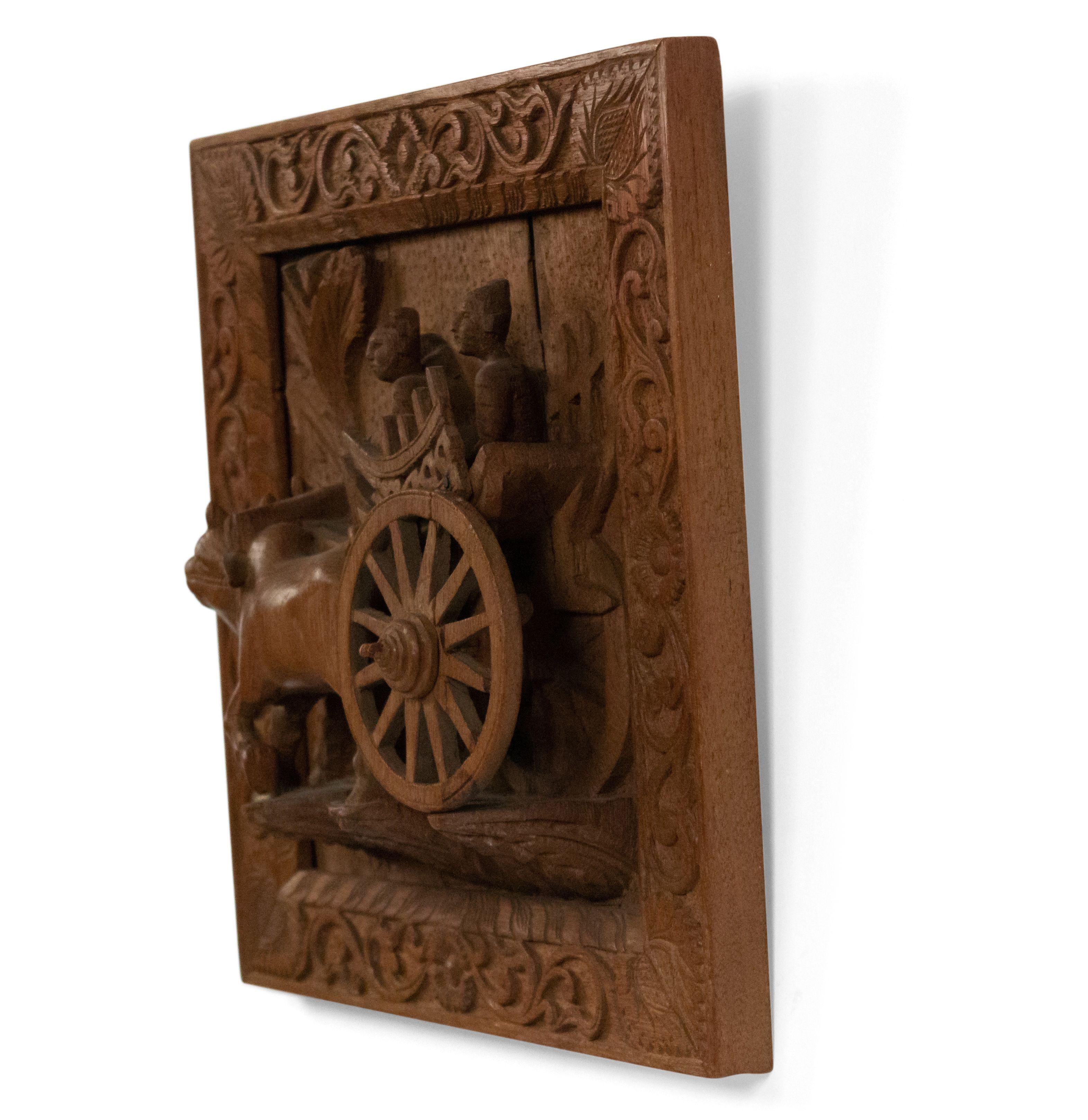 Asian Chinese style (19/20th century) stripped and carved wall plaque of figures with bull and cart.
 