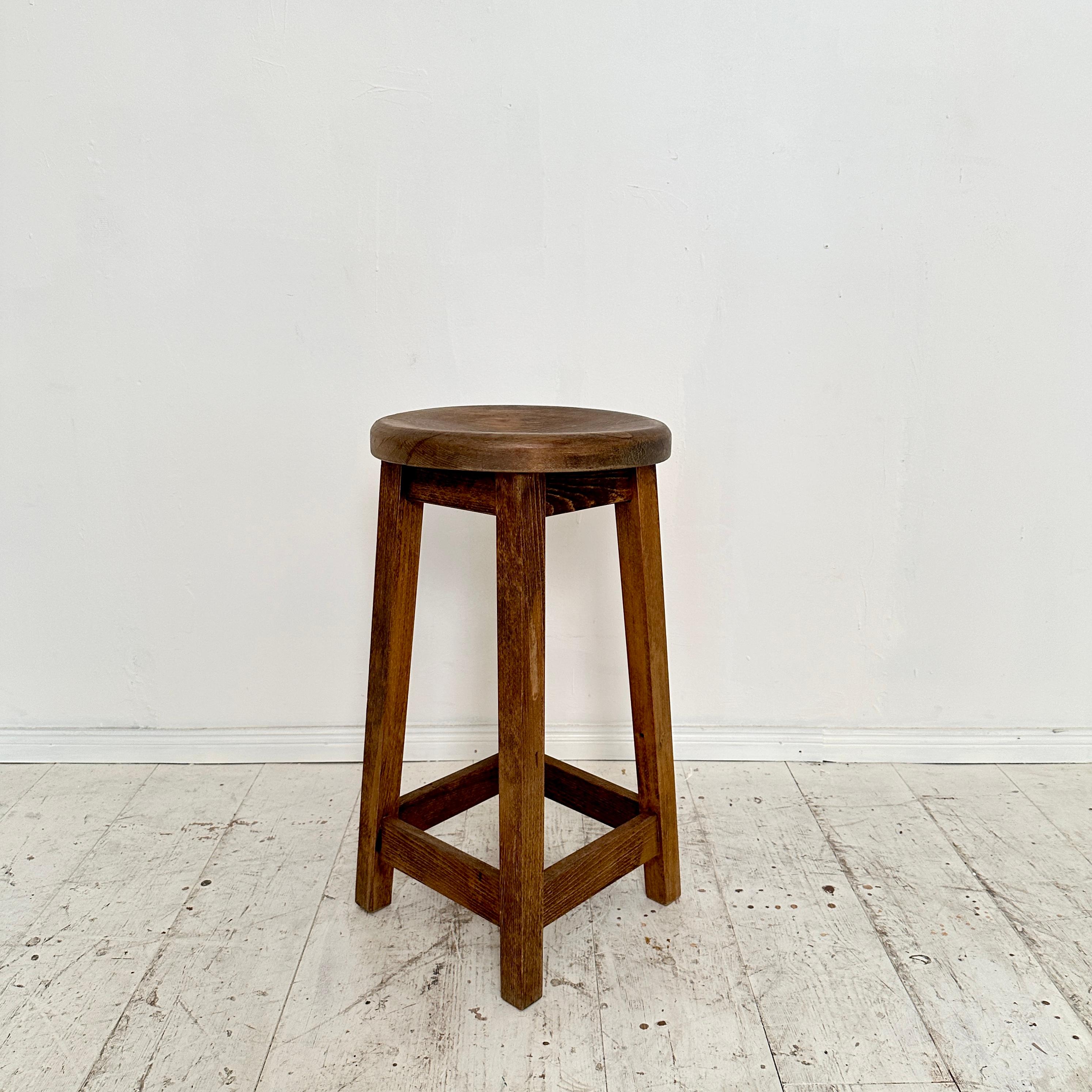 Transport yourself to the innovative spirit of the early 20th century with this iconic Bauhaus stool, crafted around 1920 from beech wood. Embodying the principles of form follows function, its minimalist design reflects the Bauhaus movement's ethos