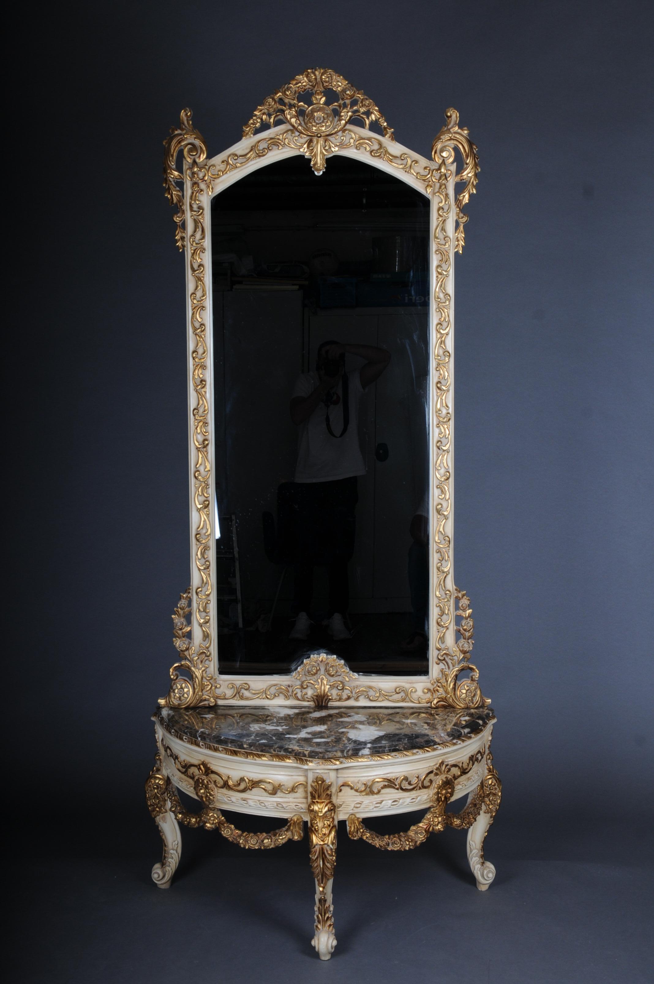 20th Century beautiful console mirror/floor mirror in the Louis XV, gilt beige.

Solid beechwood, carved and painted. Semicircular high-rectangular body on conical, fluted legs. Cambered frame with surrounding carvings, inlaid marble top. High