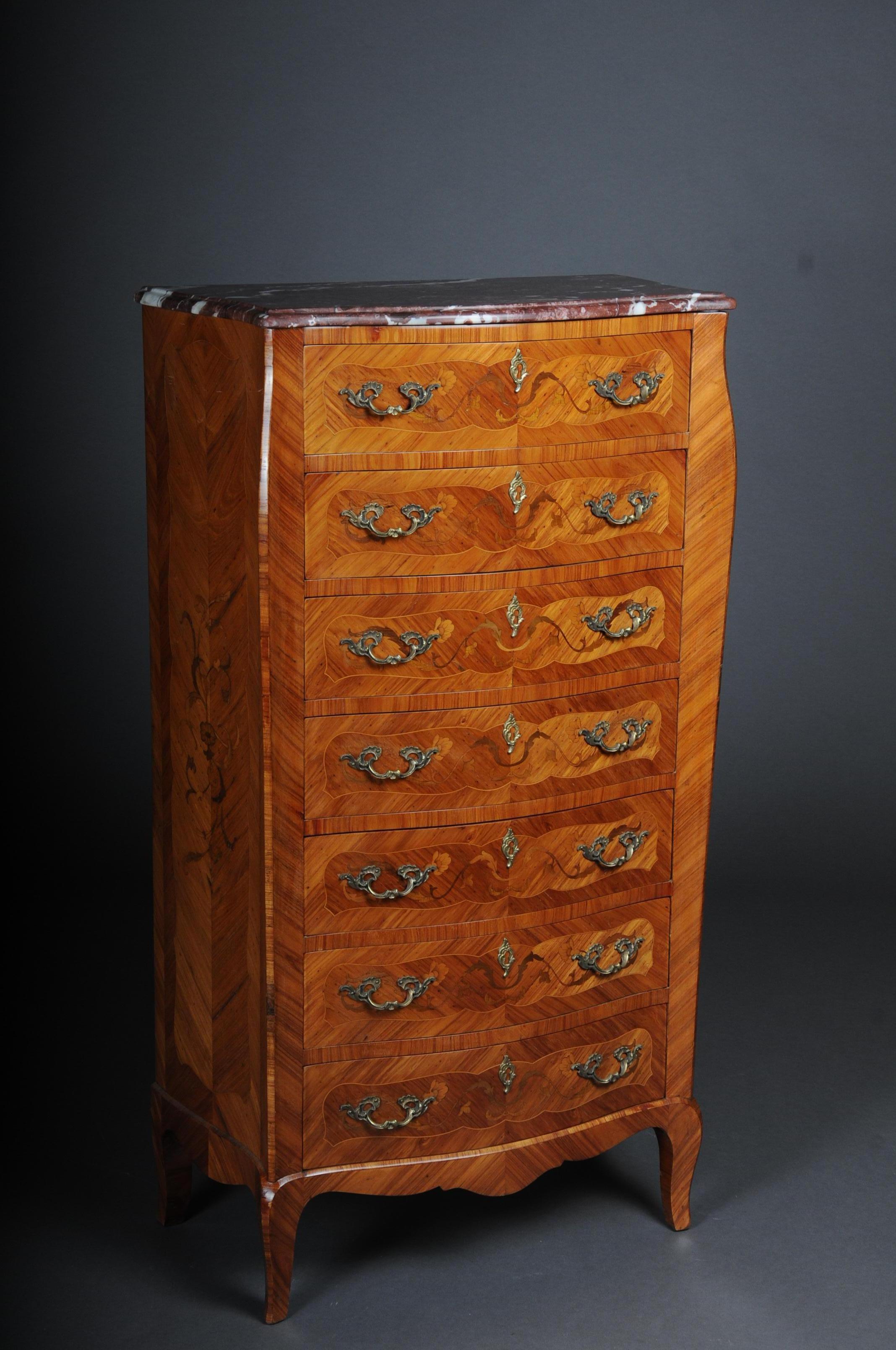 20th century beautiful high chest of drawers / chiffoniere in Louis XV
wood veneer with marquetry. So-called men's chest of drawers with 7 drawers for 7 days of the week. Various fine woods veneered on oakwood, elegant piece of furniture with a