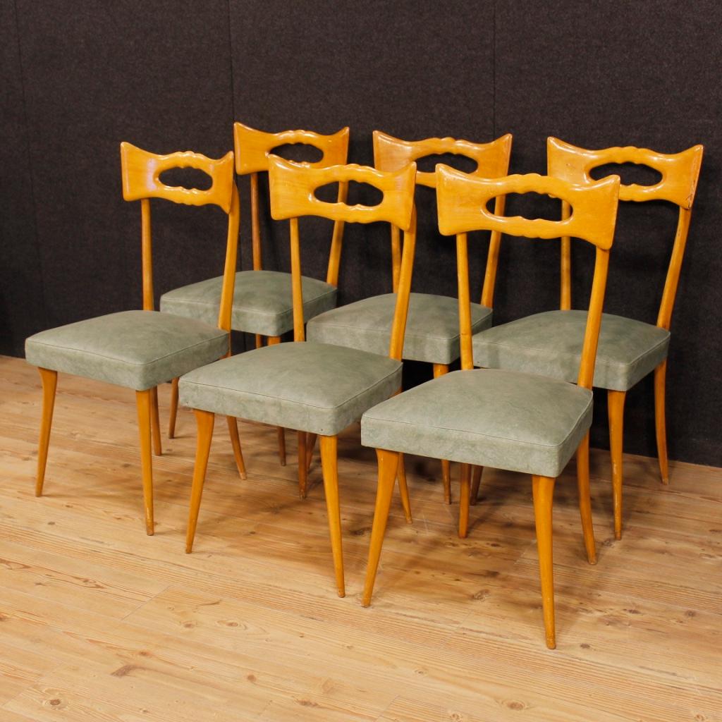 Set of 6 Italian chairs from the 1950s-1960s. Furniture carved in beech wood with seats upholstered in leatherette in style of Ico Parisi. Good quality chairs of beautiful decoration ideal to be inserted in a dining room. Padding in good condition.