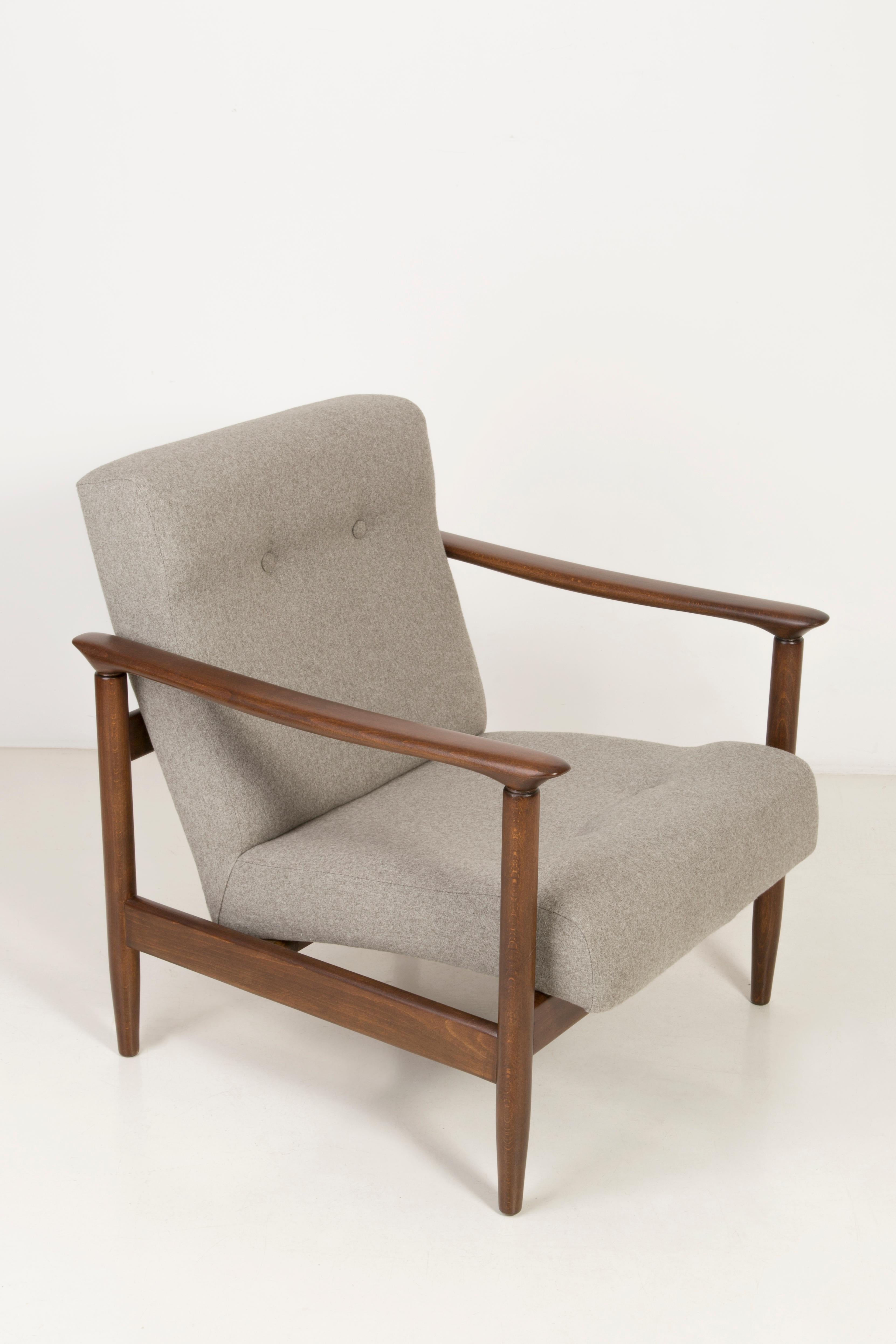 Armchair GFM-142, designed by Edmund Homa. The armchair was made in the 1960s in the Gosciecinska Furniture Factory. Material is solid beechwood. The GFM-142 armchair is regarded one of the best polish armchair design from the previous age. The