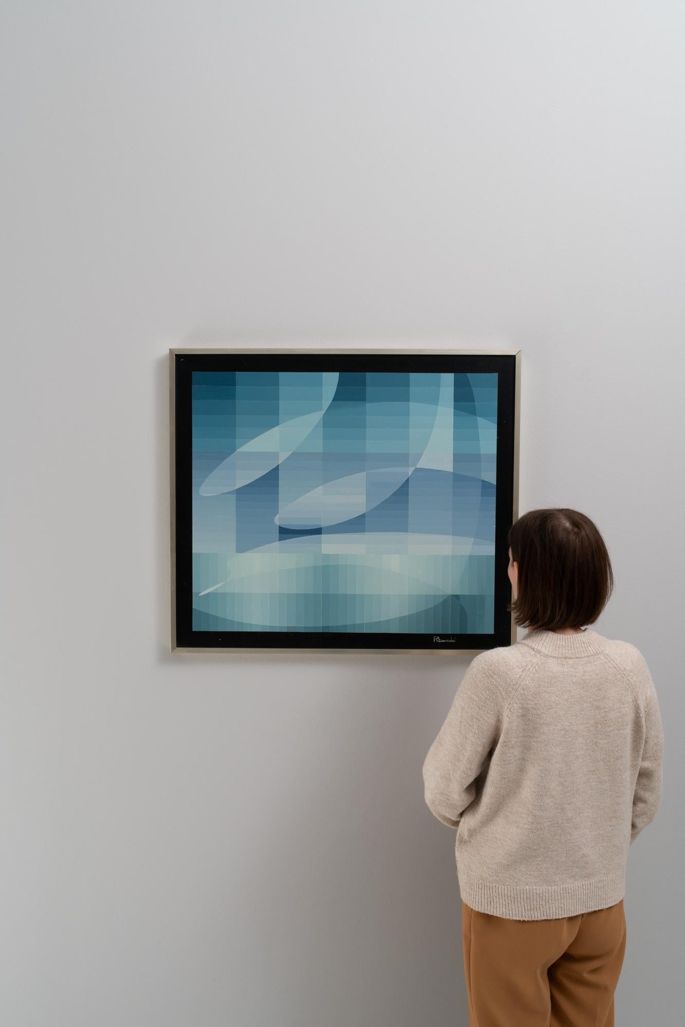 This serene 20th Century Belgian Artwork by Rene Berdal, encased in a sleek metal frame, offers a tranquil escape into the realm of abstract minimalism. Berdal's masterful use of layered shades of blue evokes the gentle ebb and flow of the sea,
