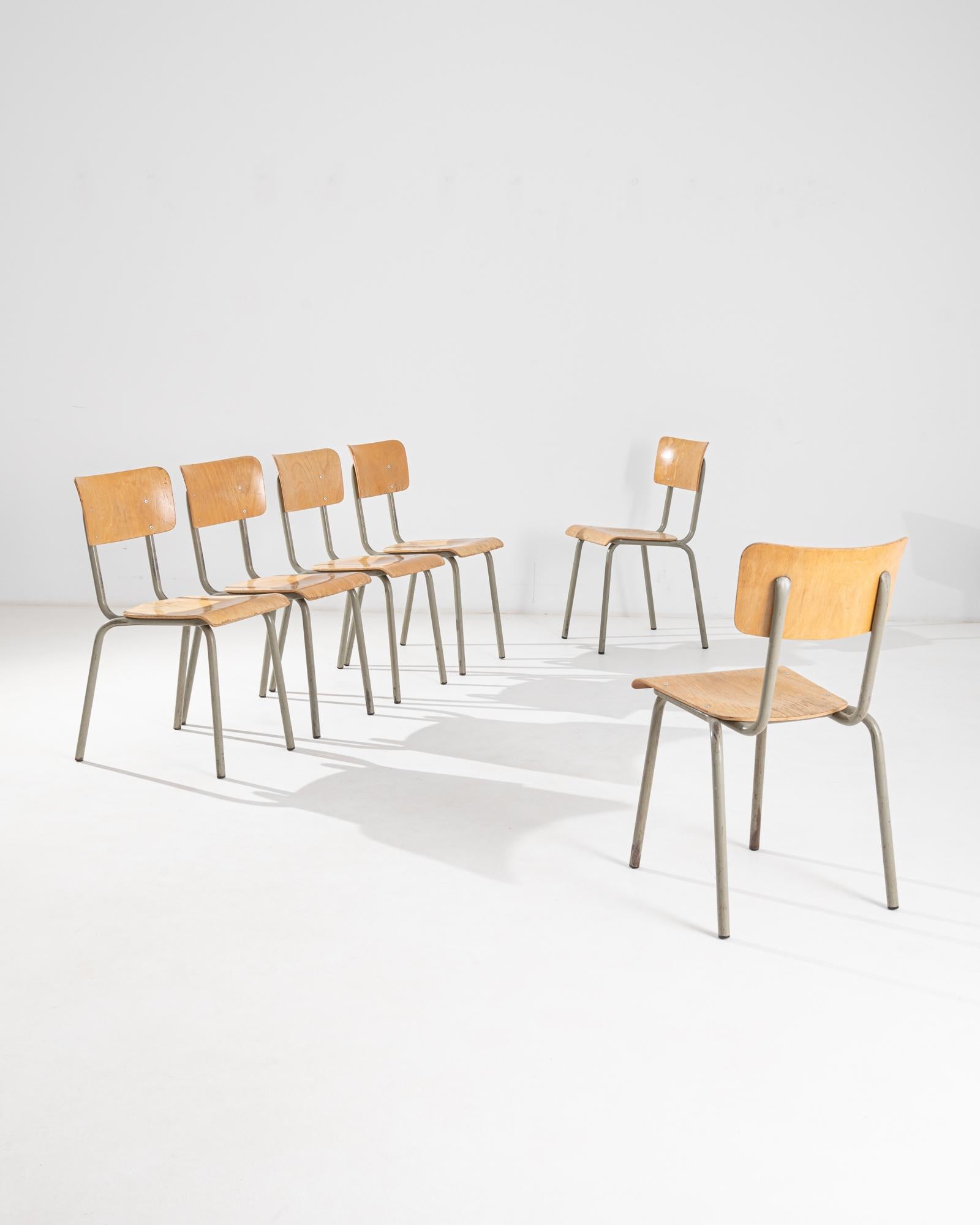 A set of six 20th century metal chairs manufactured in Belgium by the company Tubax, one of the largest Belgian manufacturers of metal furniture. Made of industrial powder-coated steel, this design is one of the best known Tubax chairs. Simple and