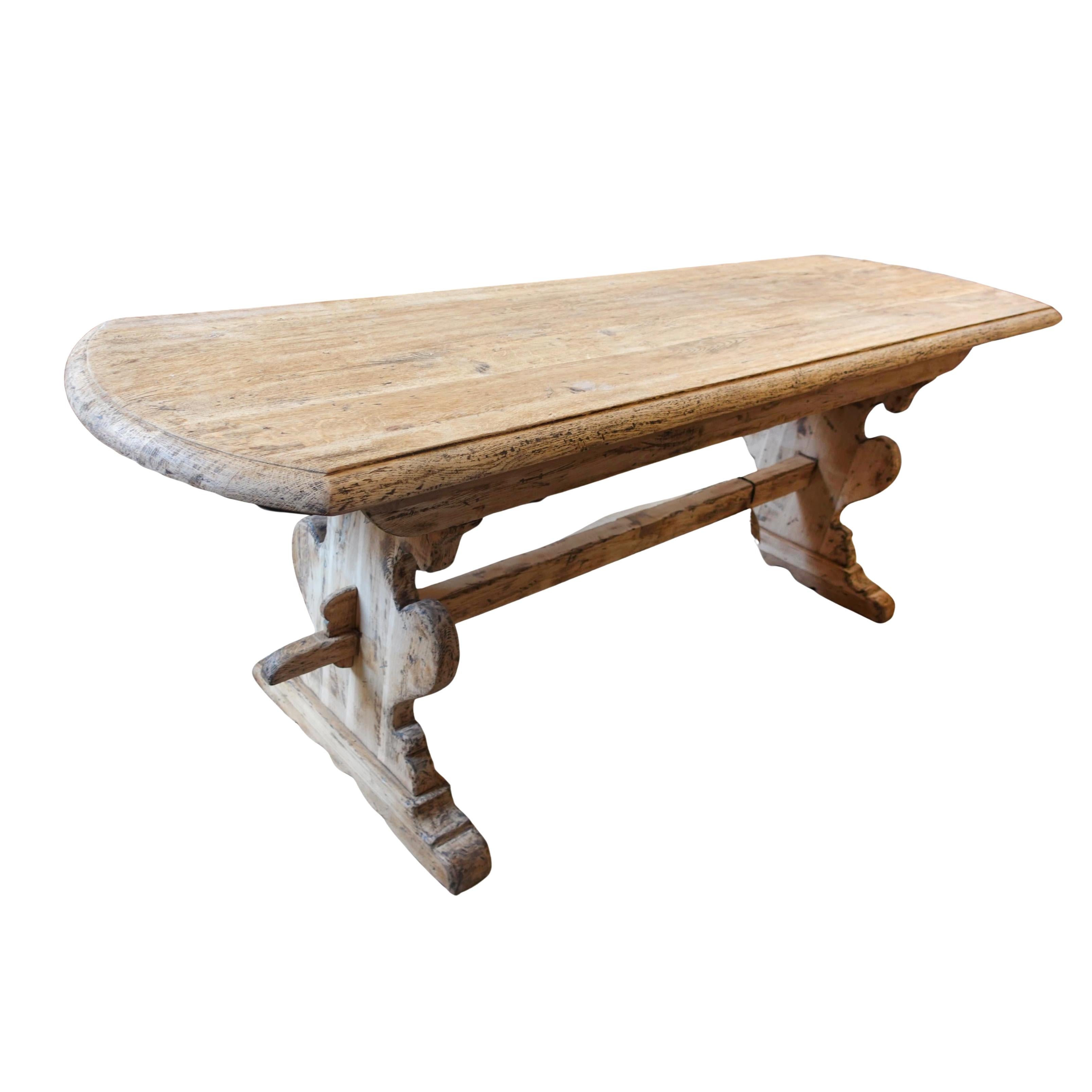 20th century Belgian Oak Monastery Table

Anonymous
Belgium; early-to-mid 20th century
Oak

Approximate size: 32.5 (h) x 76 (w) x 25 (d) in.

This imposing Belgian monastery table exudes a rustic grandeur. Hewn from solid, robust oak, its thick
