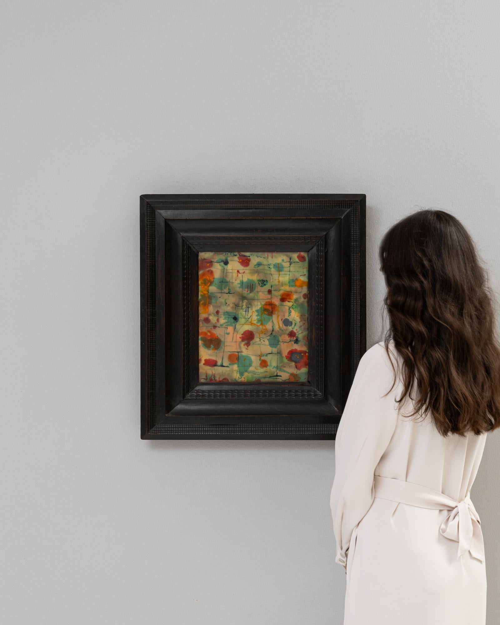 Nestled within a deep, dark frame, this 20th-century Belgian painting is a whimsical tapestry of vibrant colors and abstract forms. The compact canvas bursts with an array of playful, bright spots that dance across a subtly textured background,