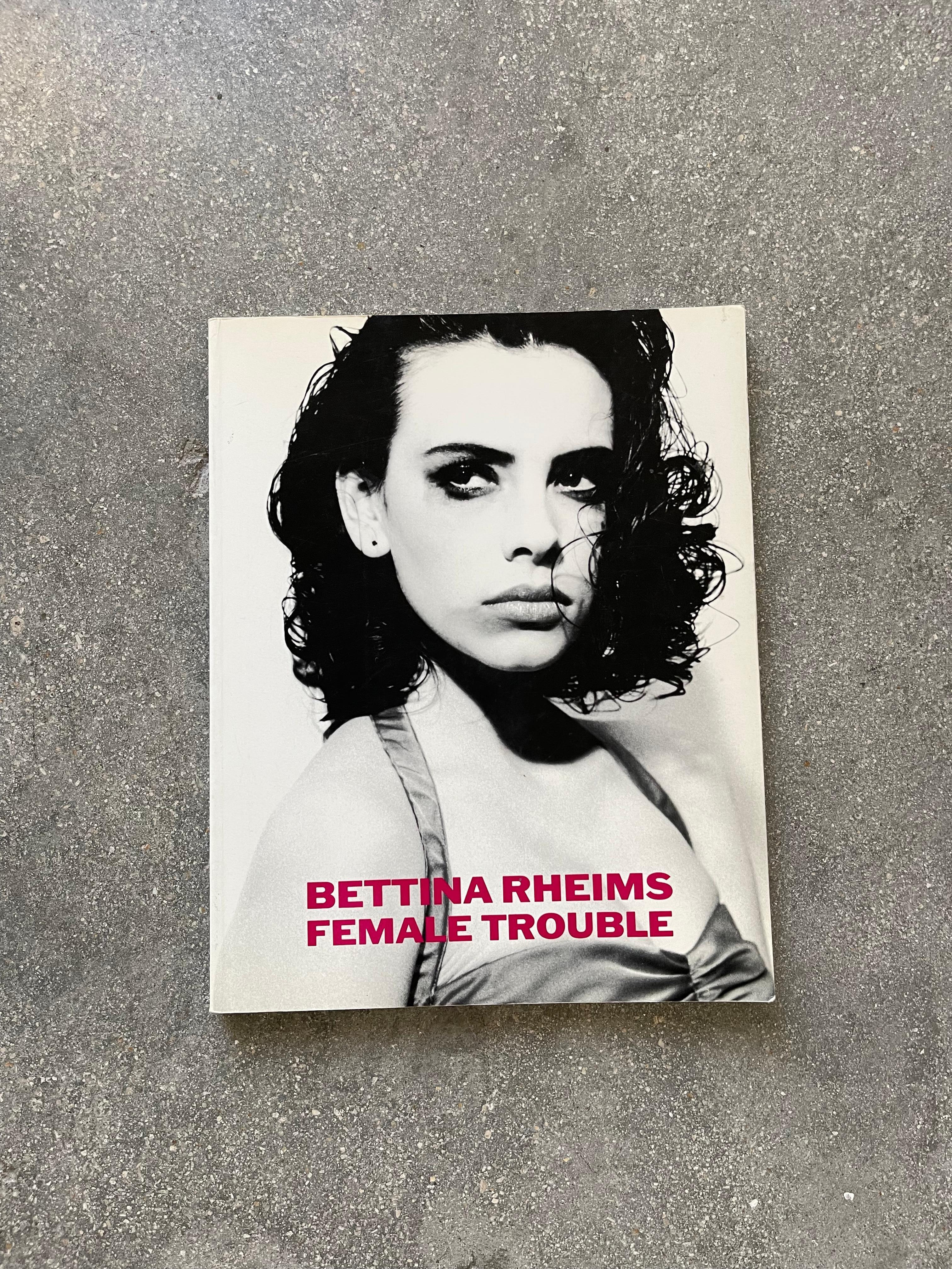 20th century Bettina Rheims: Female Trouble Photography Book. Bettina Rheims has been one of the most acclaimed woman photographers of France since the early 80s, when she first showed her sensational female nudes and portraits. Film stars,